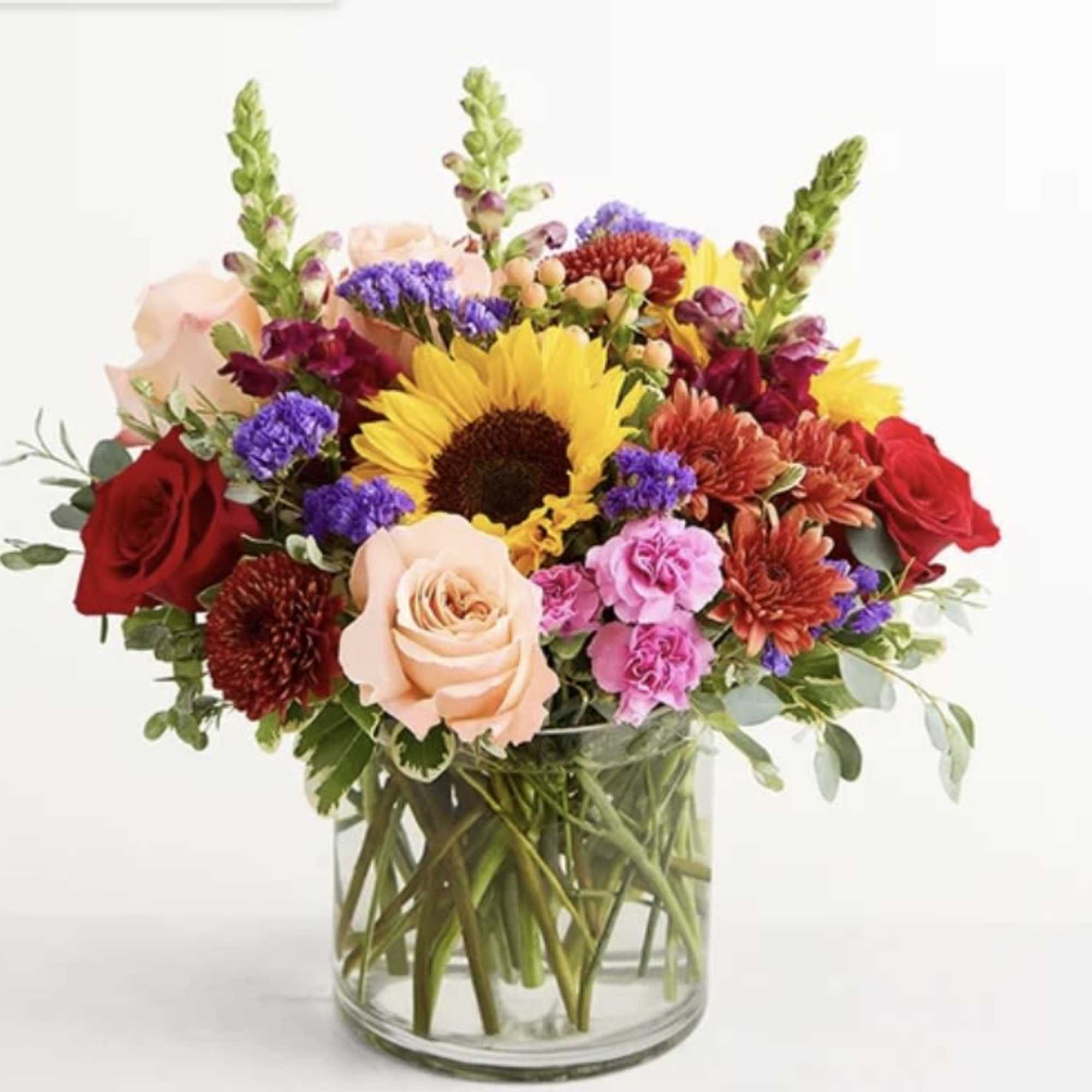 As bountiful as a robust autumn harvest, this bouquet is a dazzling