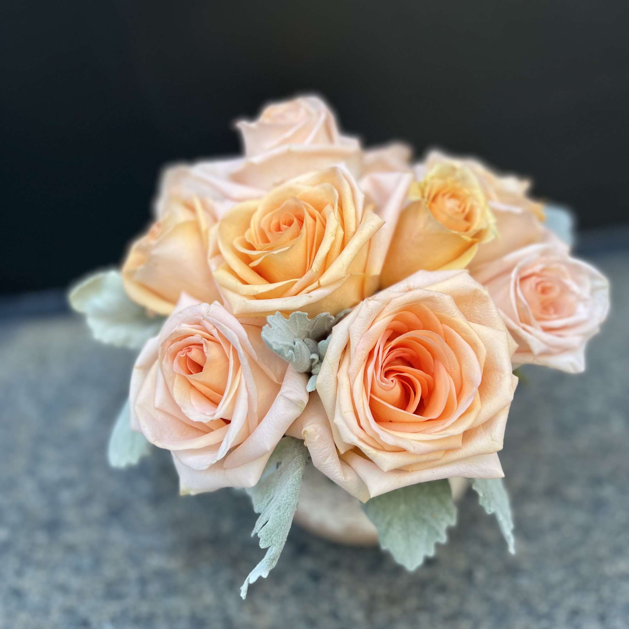 Peach roses are delicate yet charming, making this arrangement elegant and breathe-taking.