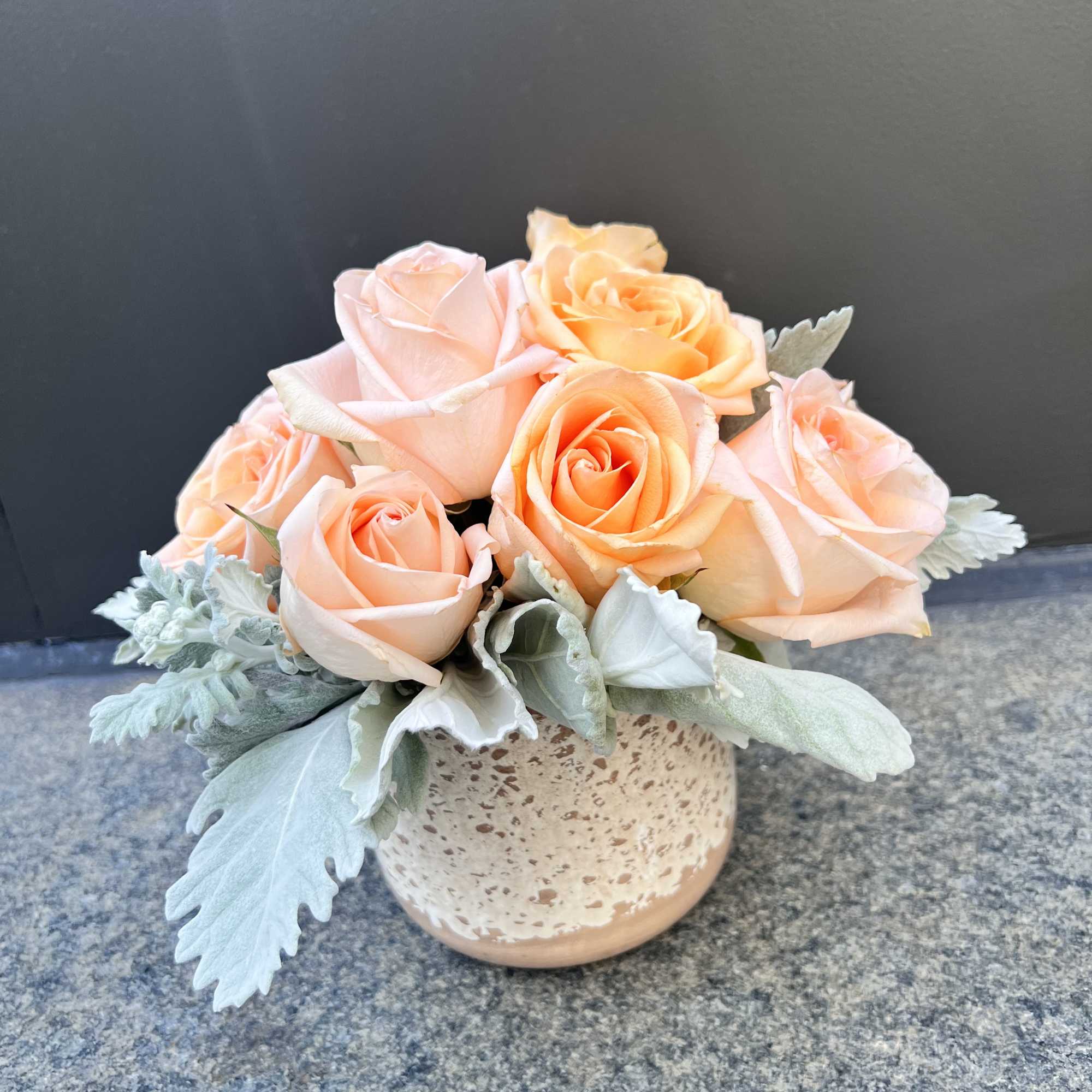 Peach roses are delicate yet charming, making this arrangement elegant and breathe-taking.