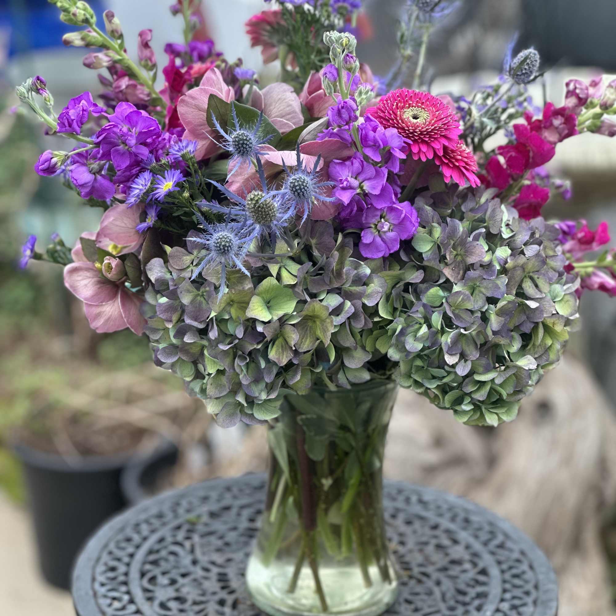 This arrangement is a very modern take on the deep colors that