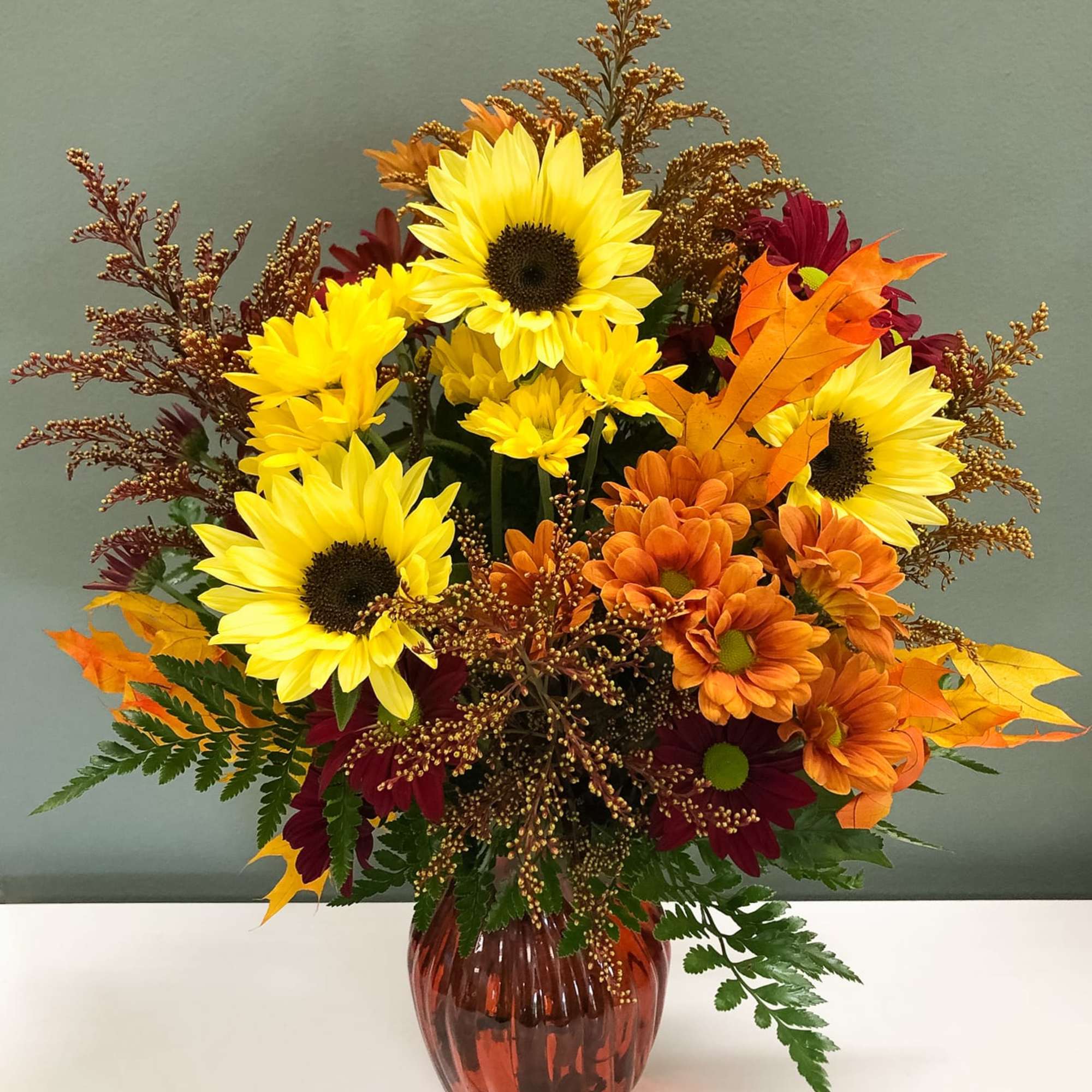 Florist designed bouquet. Your designer will select an assortment of fresh fall