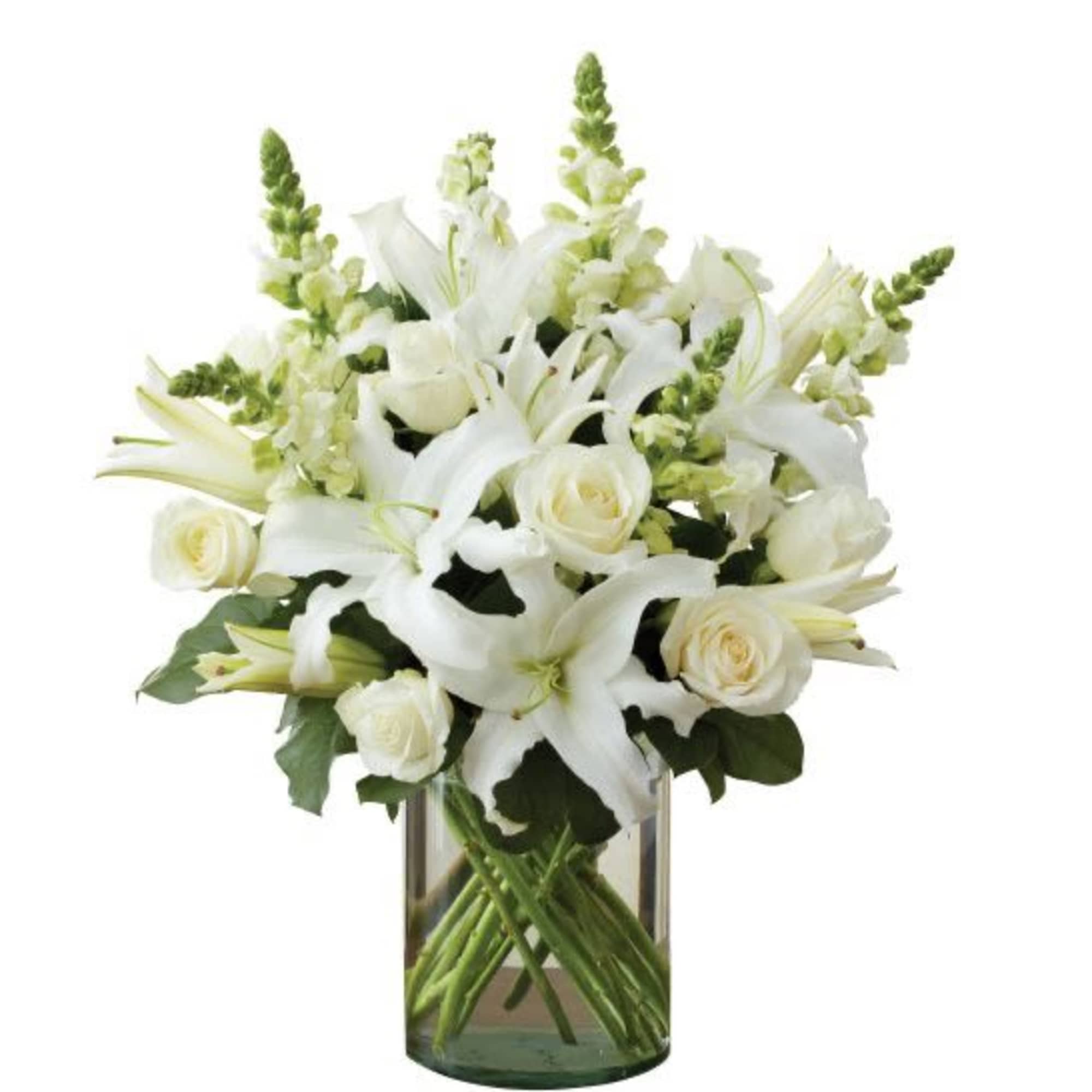 All-around arrangement with white roses, lilies and snapdragons; accented with greenery Artistically All-around arrangement with white roses, lilies and snapdragons; accented with greenery Artistically