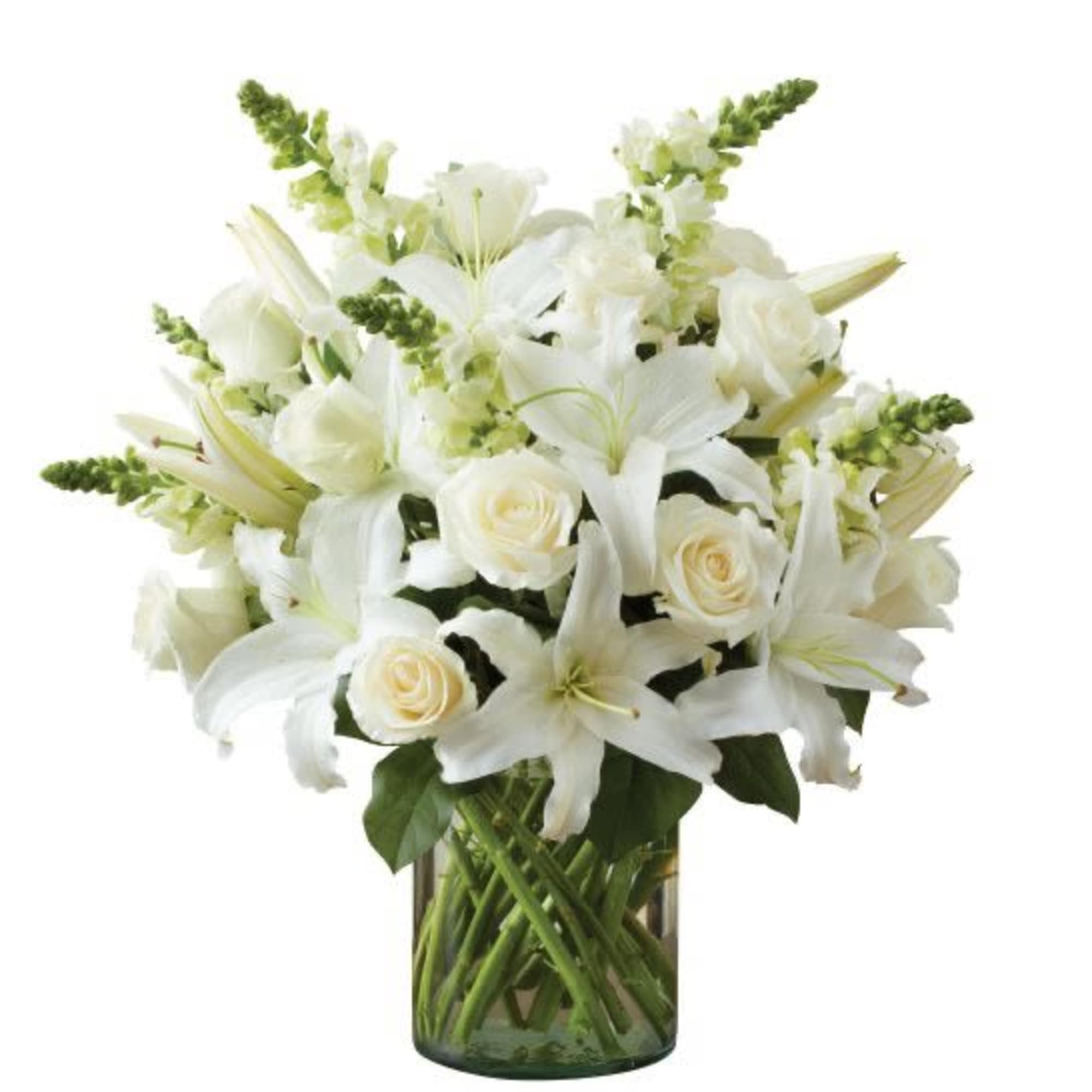 All-around arrangement with white roses, lilies and snapdragons; accented with greenery Artistically All-around arrangement with white roses, lilies and snapdragons; accented with greenery Artistically