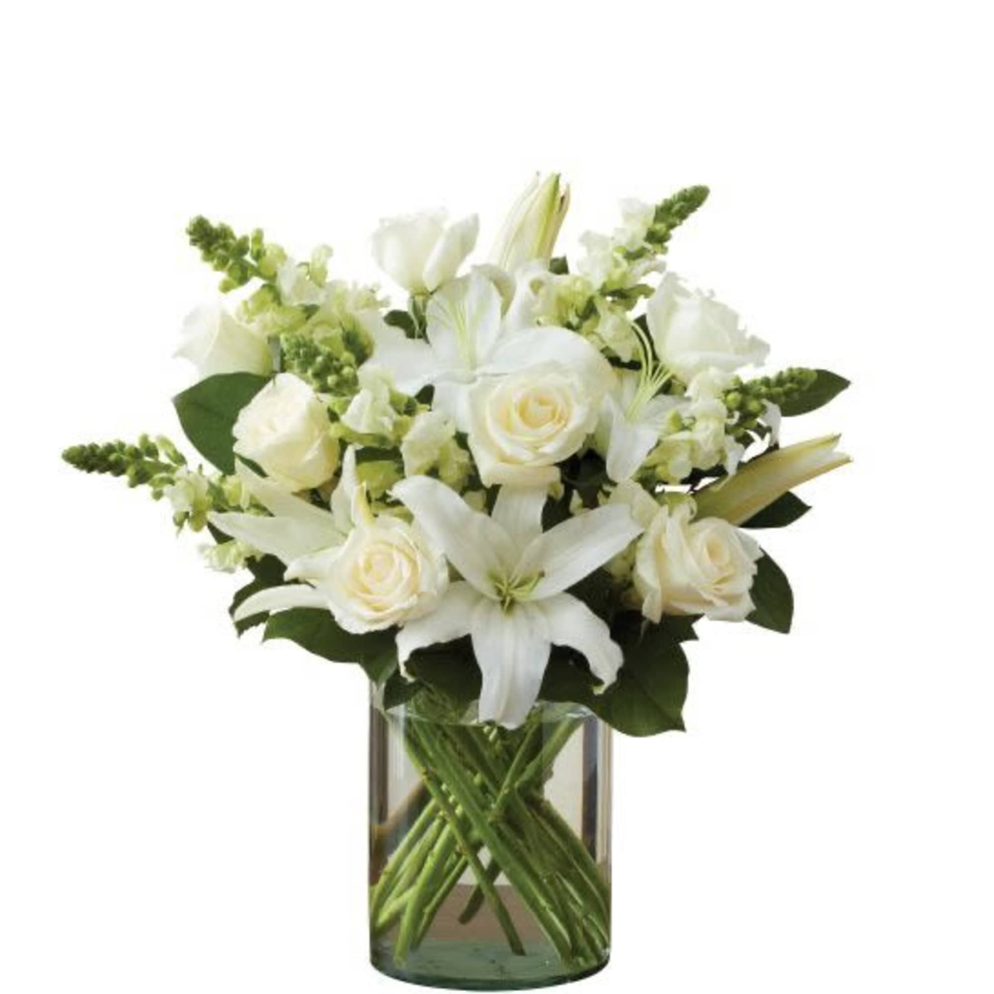 All-around arrangement with white roses, lilies and snapdragons; accented with greenery Artistically All-around arrangement with white roses, lilies and snapdragons; accented with greenery Artistically