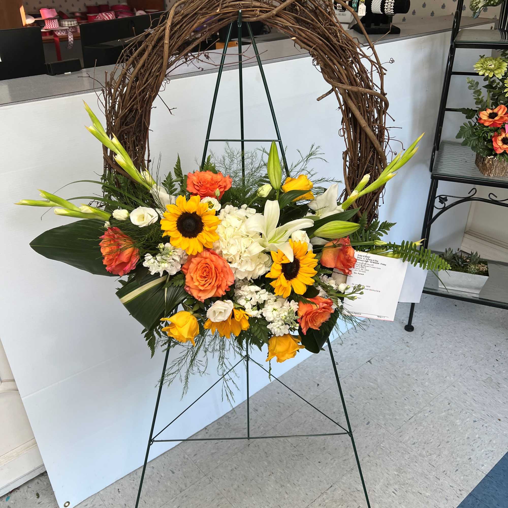 Grape vine wreath is all natural live flowers attached as seen. 