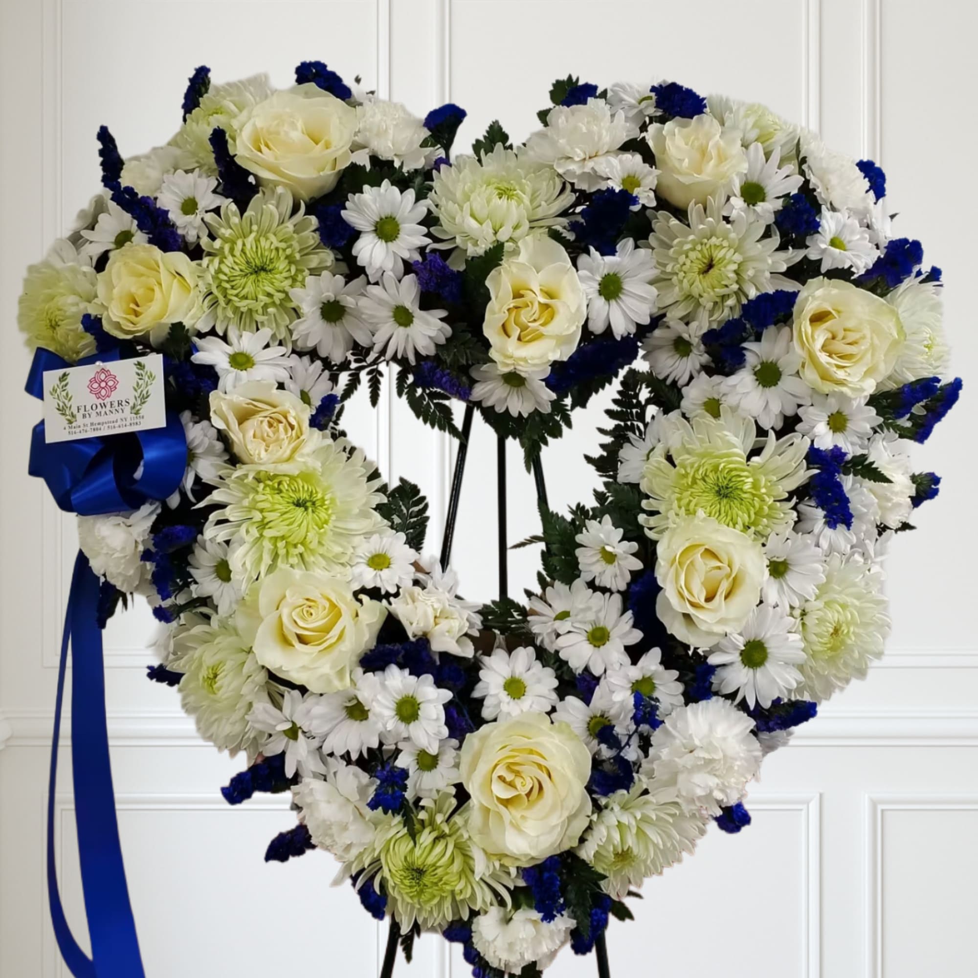 White mixed flowers and touches of blue.