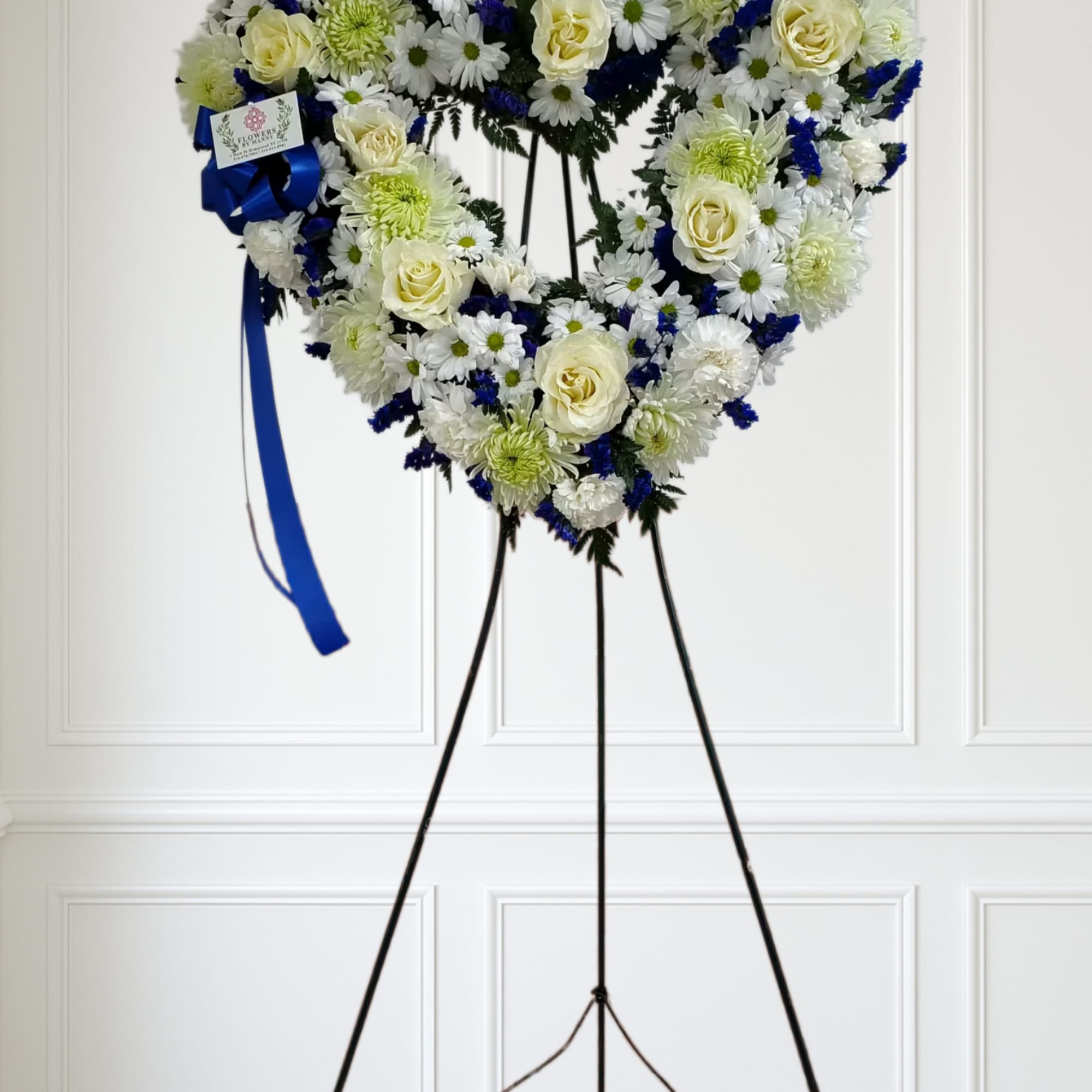 White mixed flowers and touches of blue.