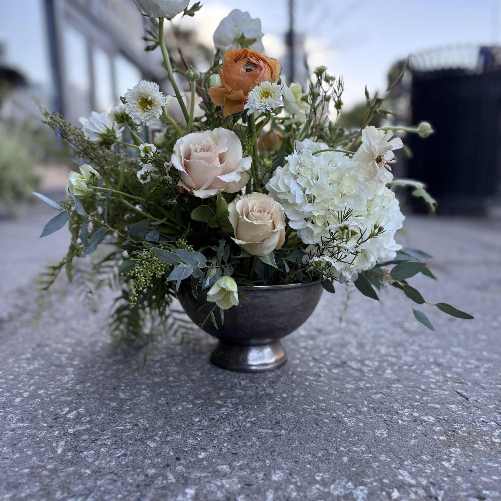 Cast in Rembrandt worthy pewter like vessel - this arrangement is a