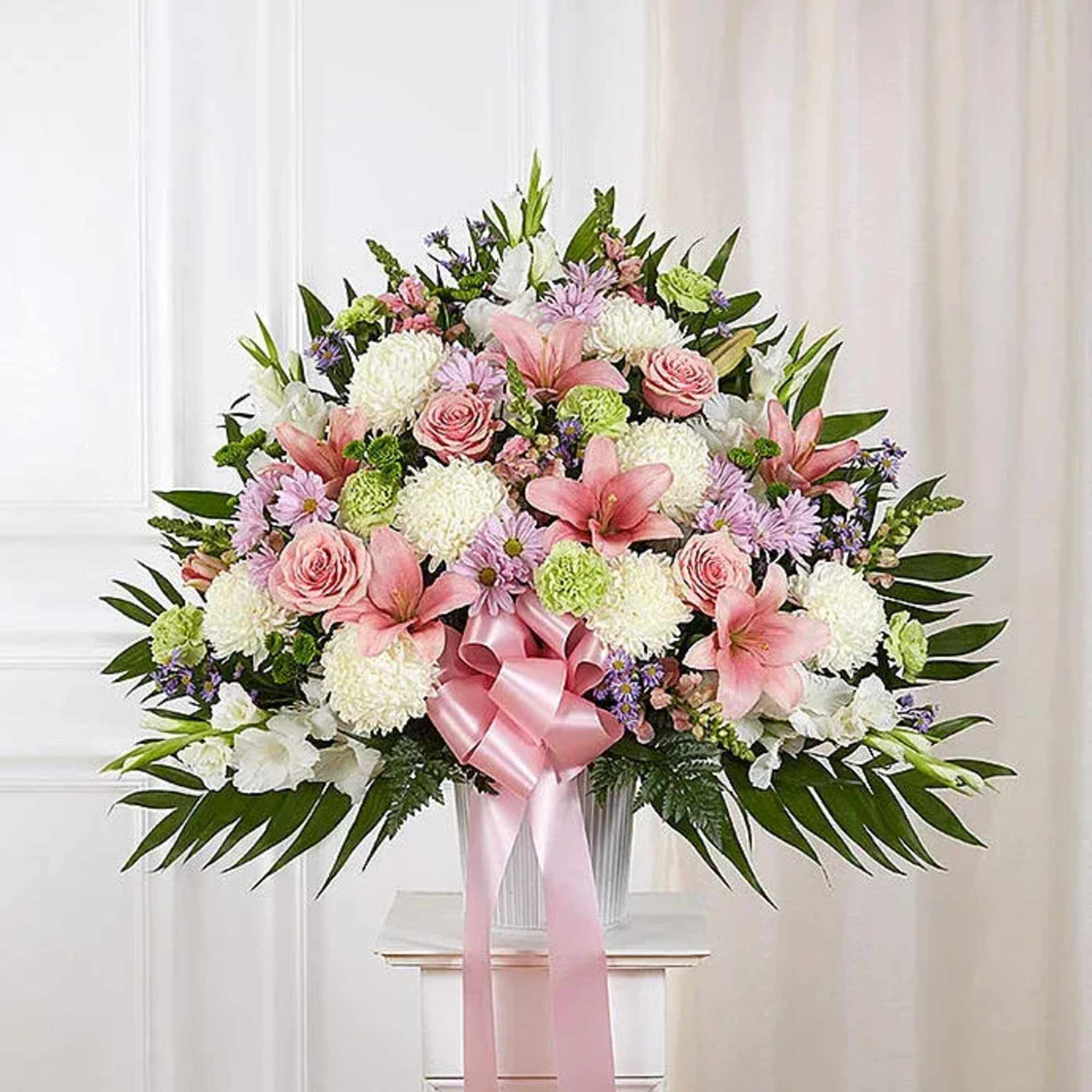 Soft, graceful, and full of heartfelt sentiment, this beautiful standing basket is Soft, graceful, and full of heartfelt sentiment, this beautiful standing basket is