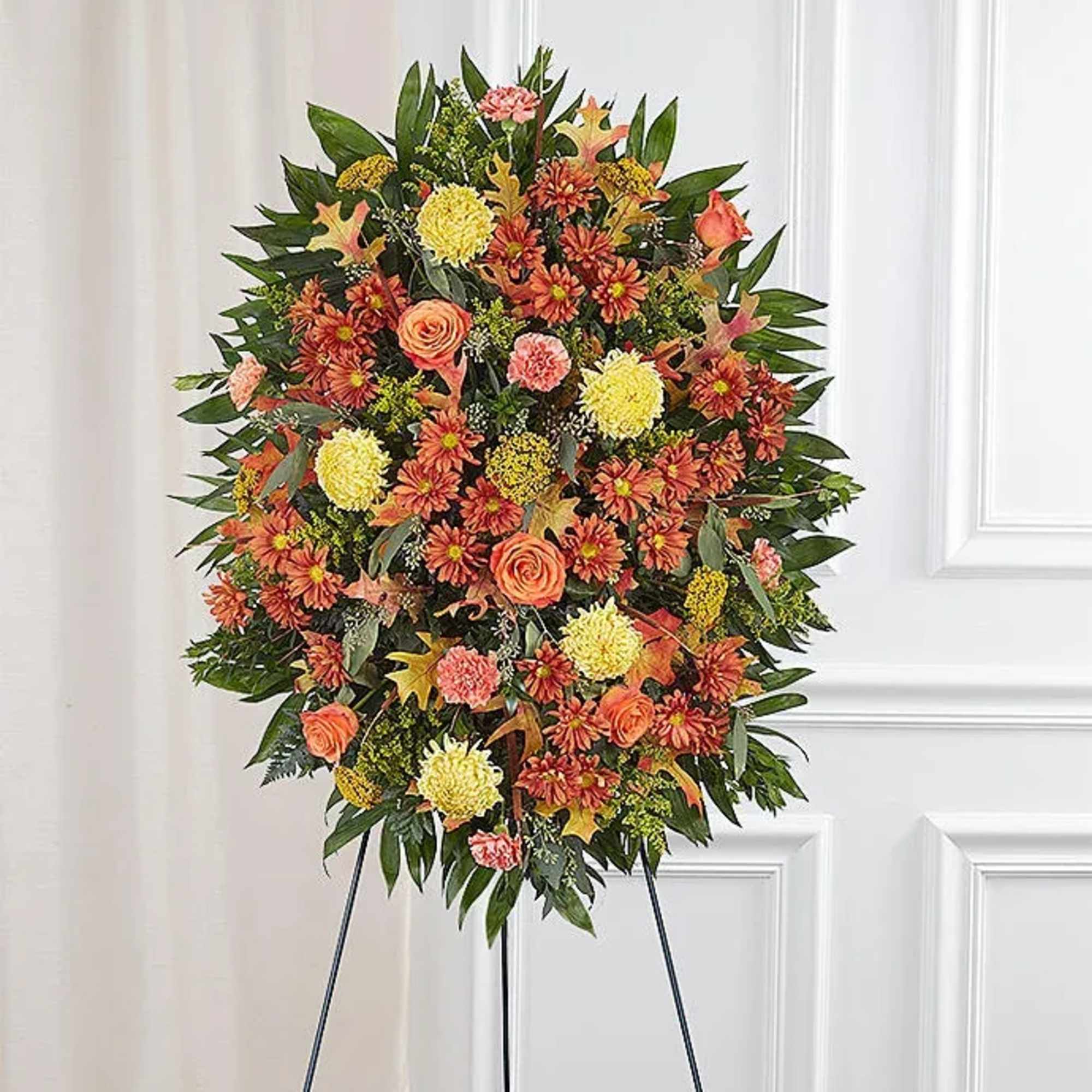 This beautiful standing spray captures the warmth and richness of the season