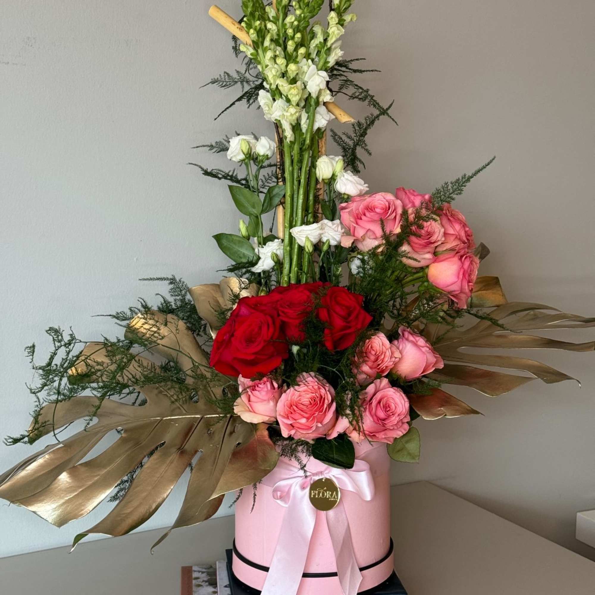 Beautiful pink and red rose floral arrangement, perfect for any occasion. With