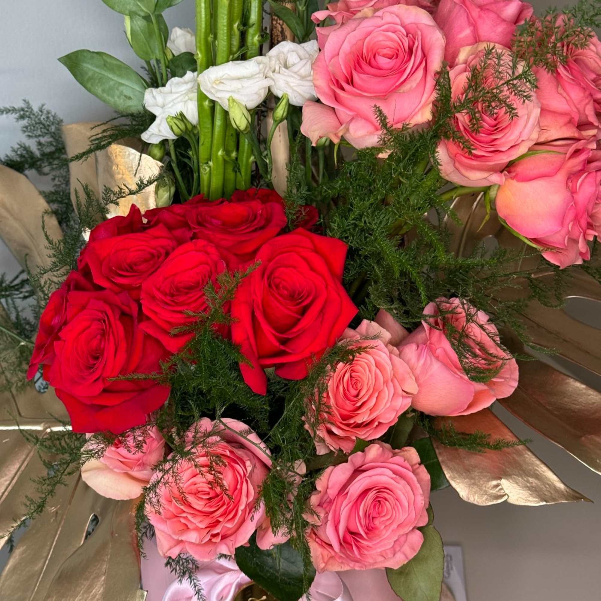 Beautiful pink and red rose floral arrangement, perfect for any occasion. With