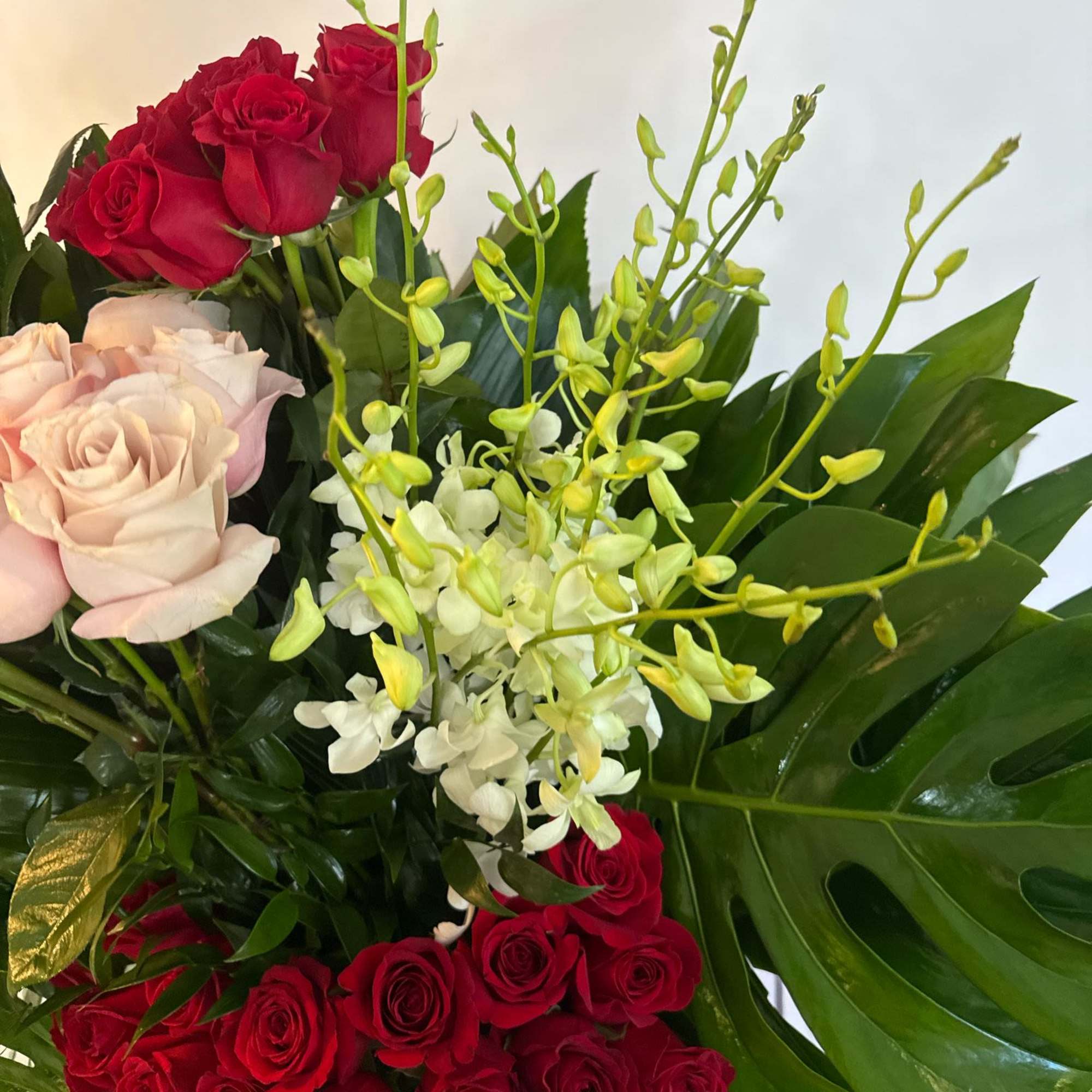 Experience the magic of beauty with our Enchanted Bloom Arrangement, a breathtaking