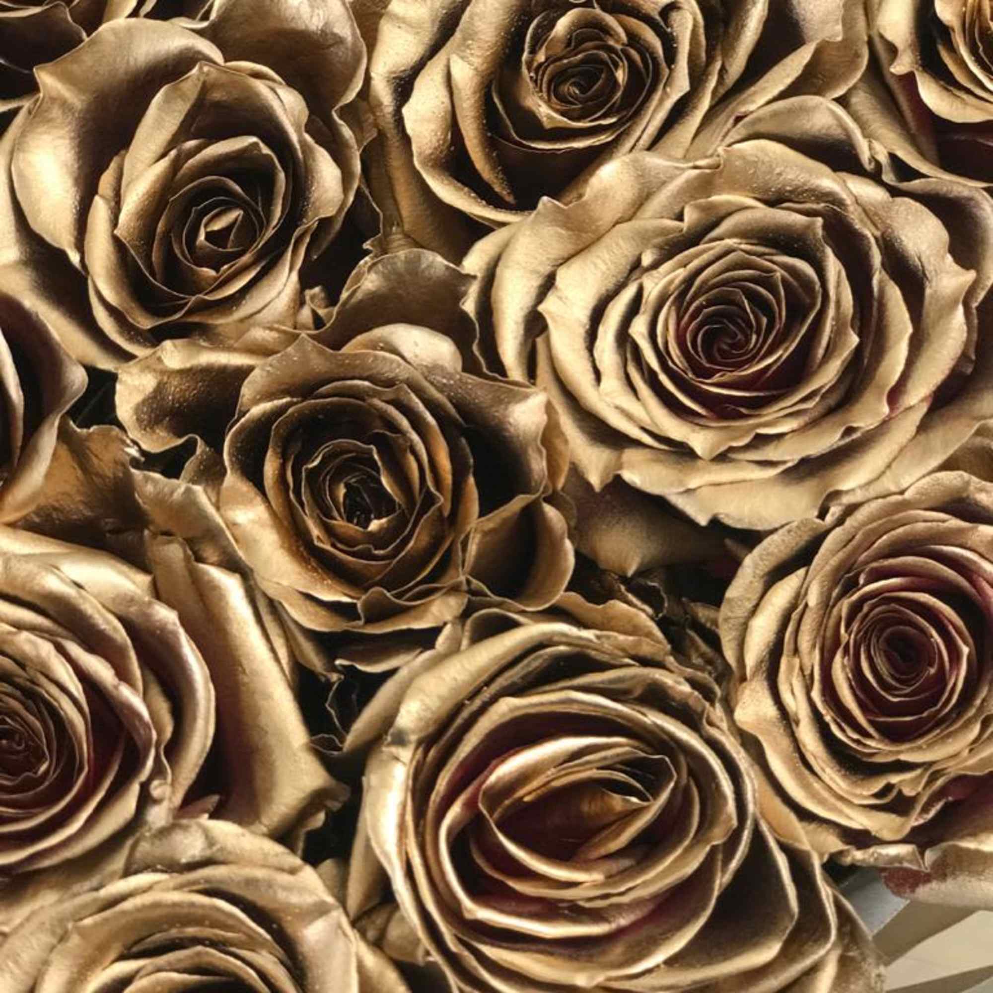 Elegant box filled with approximately 20 gold roses, offering a luxurious and