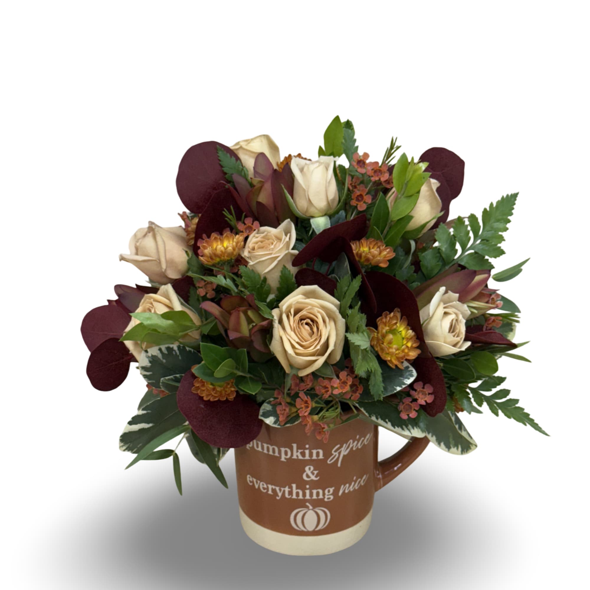Celebrate cozy autumn vibes with this charming arrangement in a seasonal mug