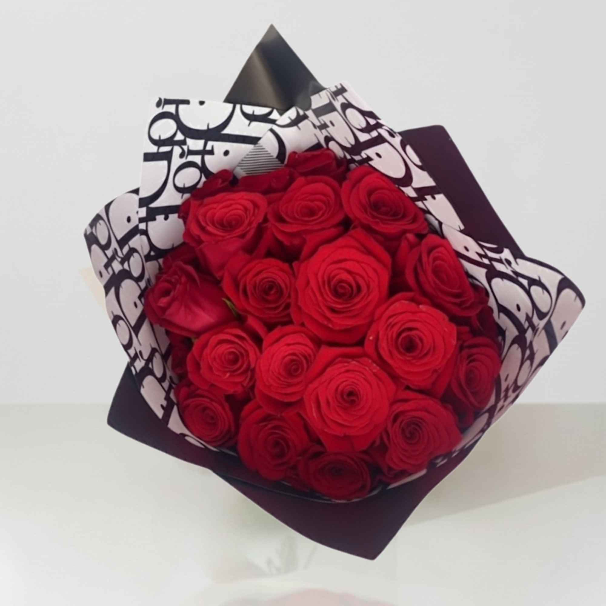 Make a bold and unforgettable statement with our Luxury Red Rose Bouquet
