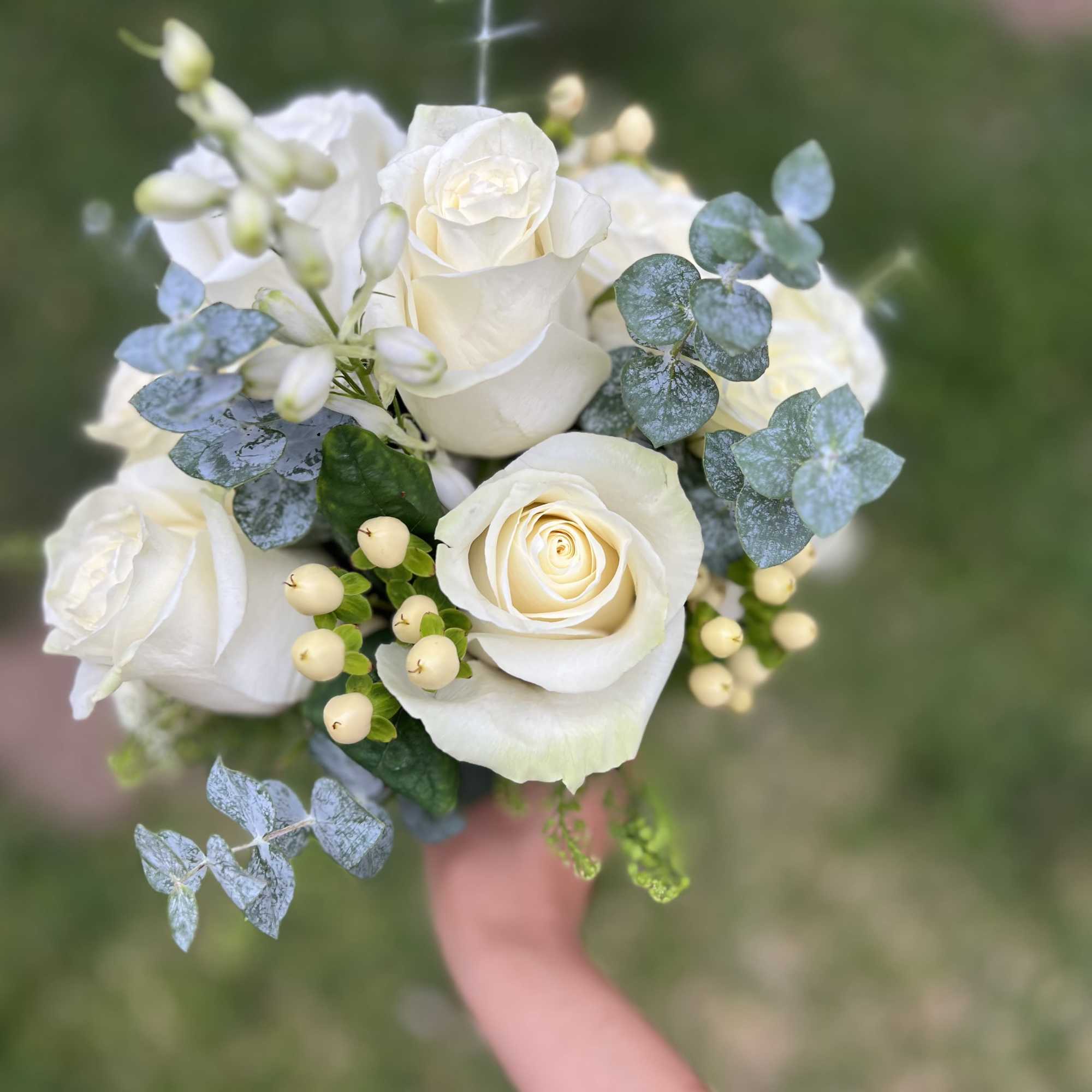 Product Information 
mix of all white florals such as roses, spray 