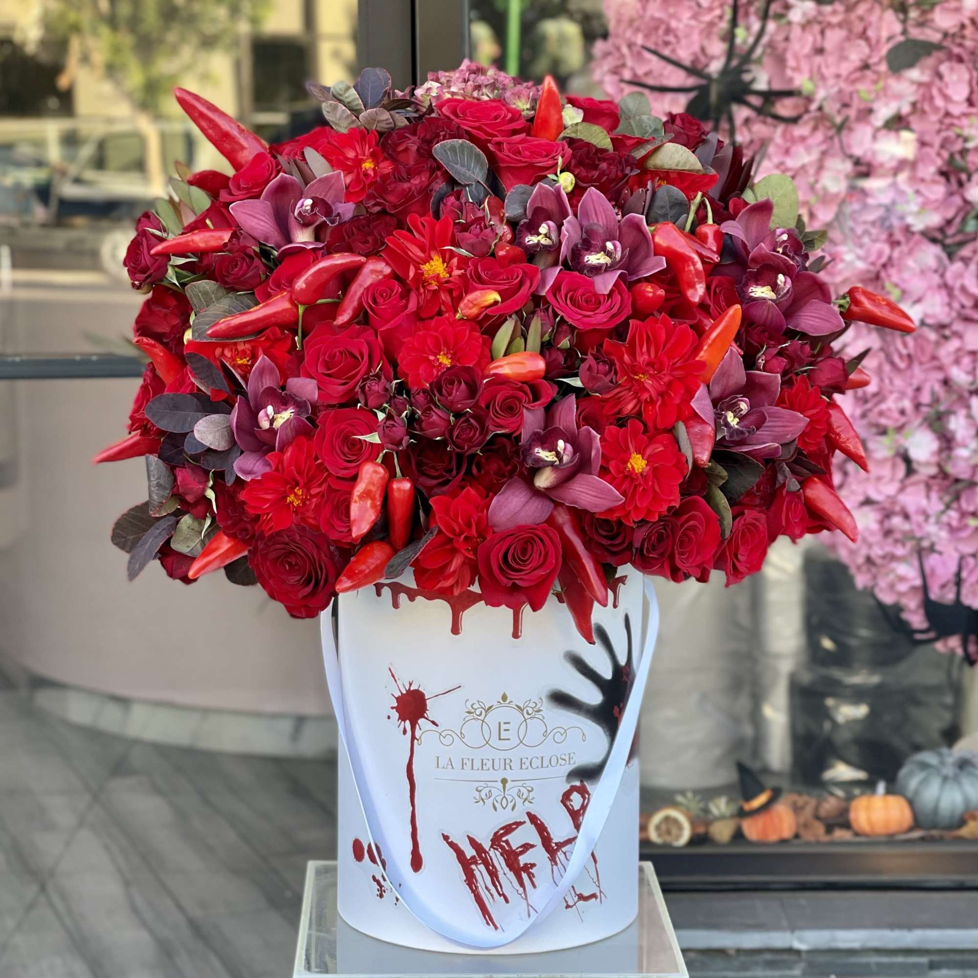 125 flowers . All Red Flowers in a white box 