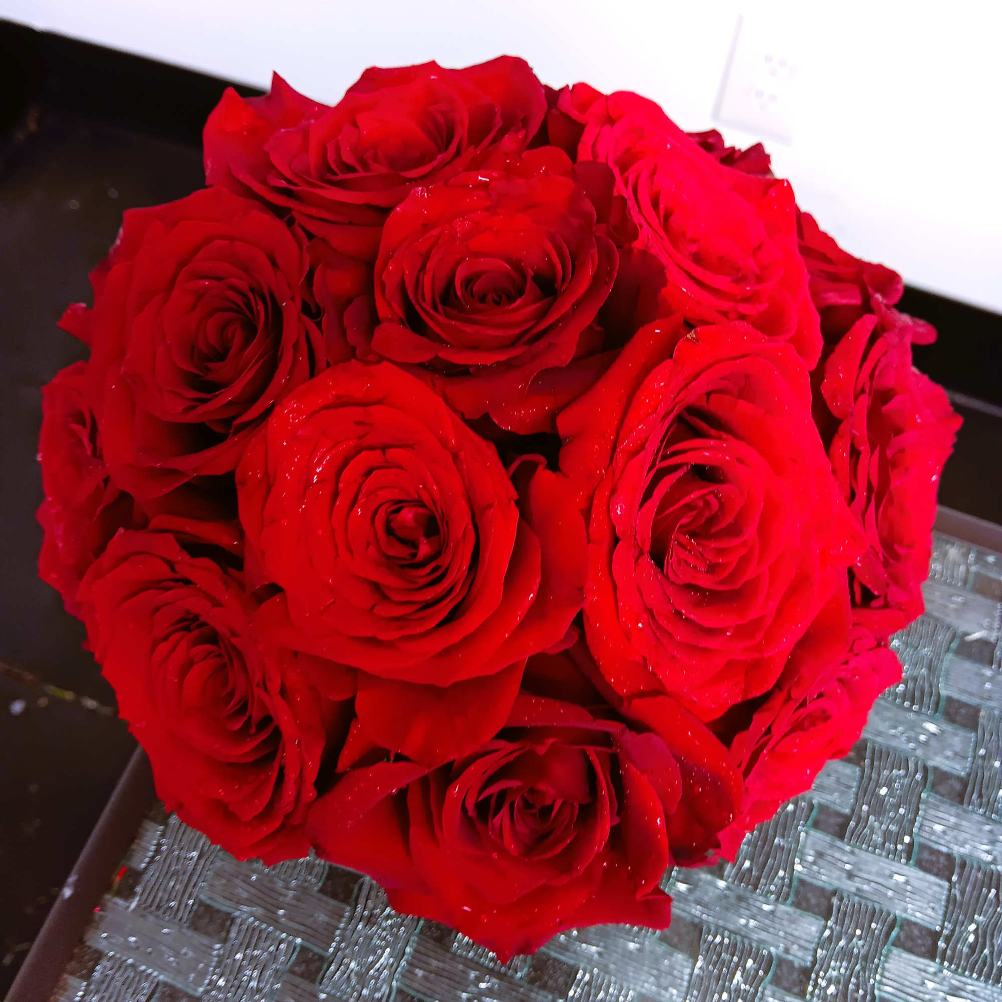 Stunning and classic, red roses in red velvet box is a great
