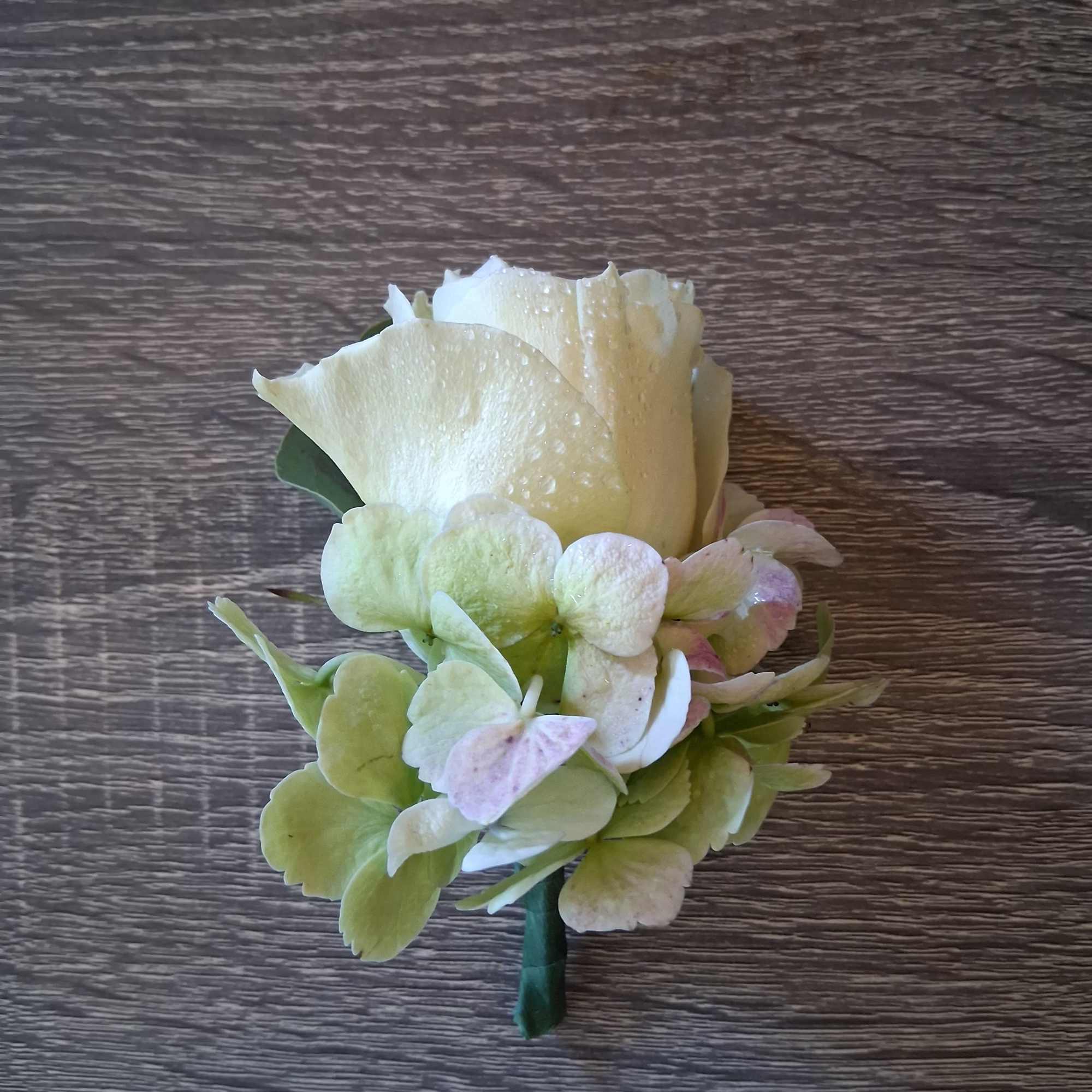 Beautiful white small garden rose with wantage white/green hydrangea