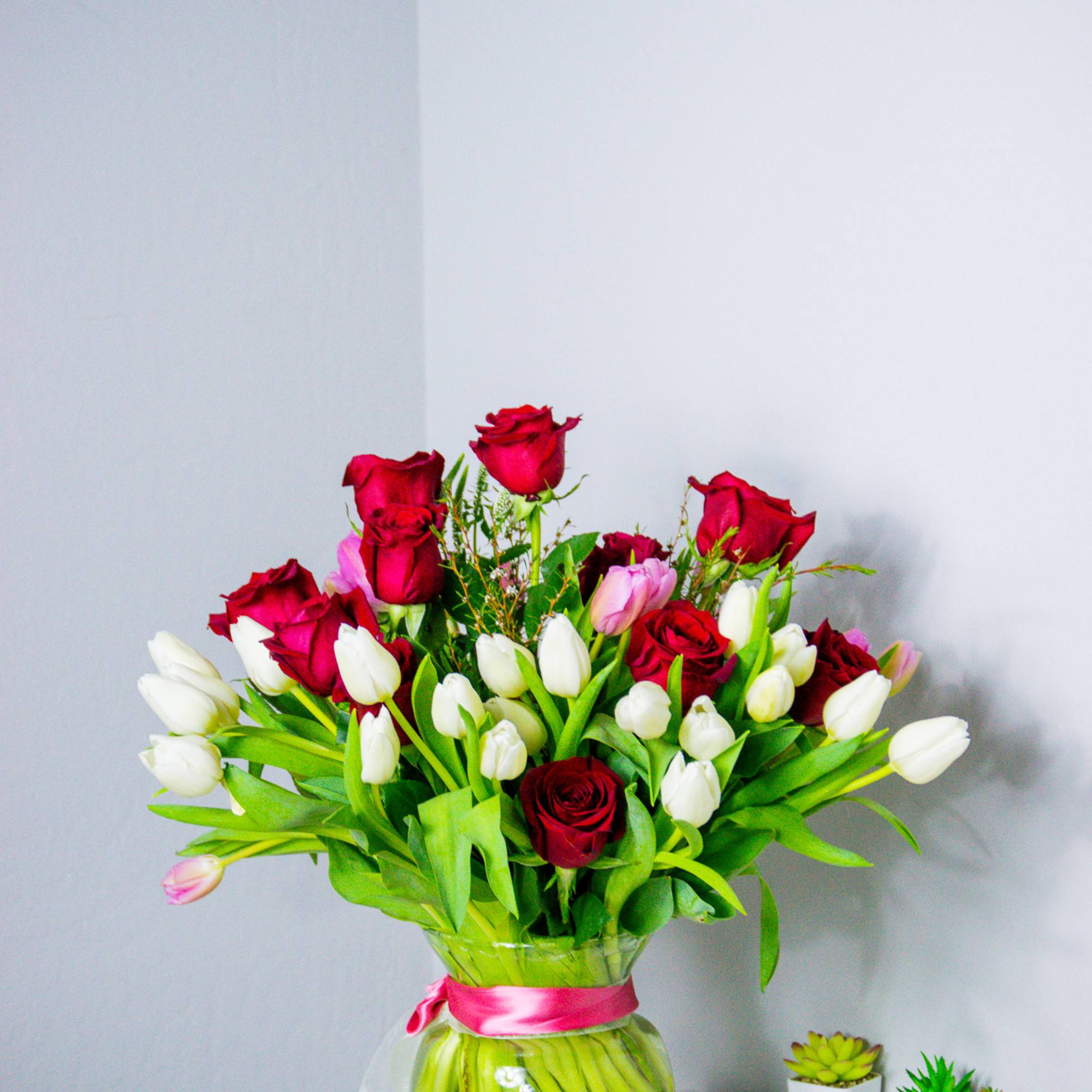 Mix of 40 tulips and a dozen red roses
