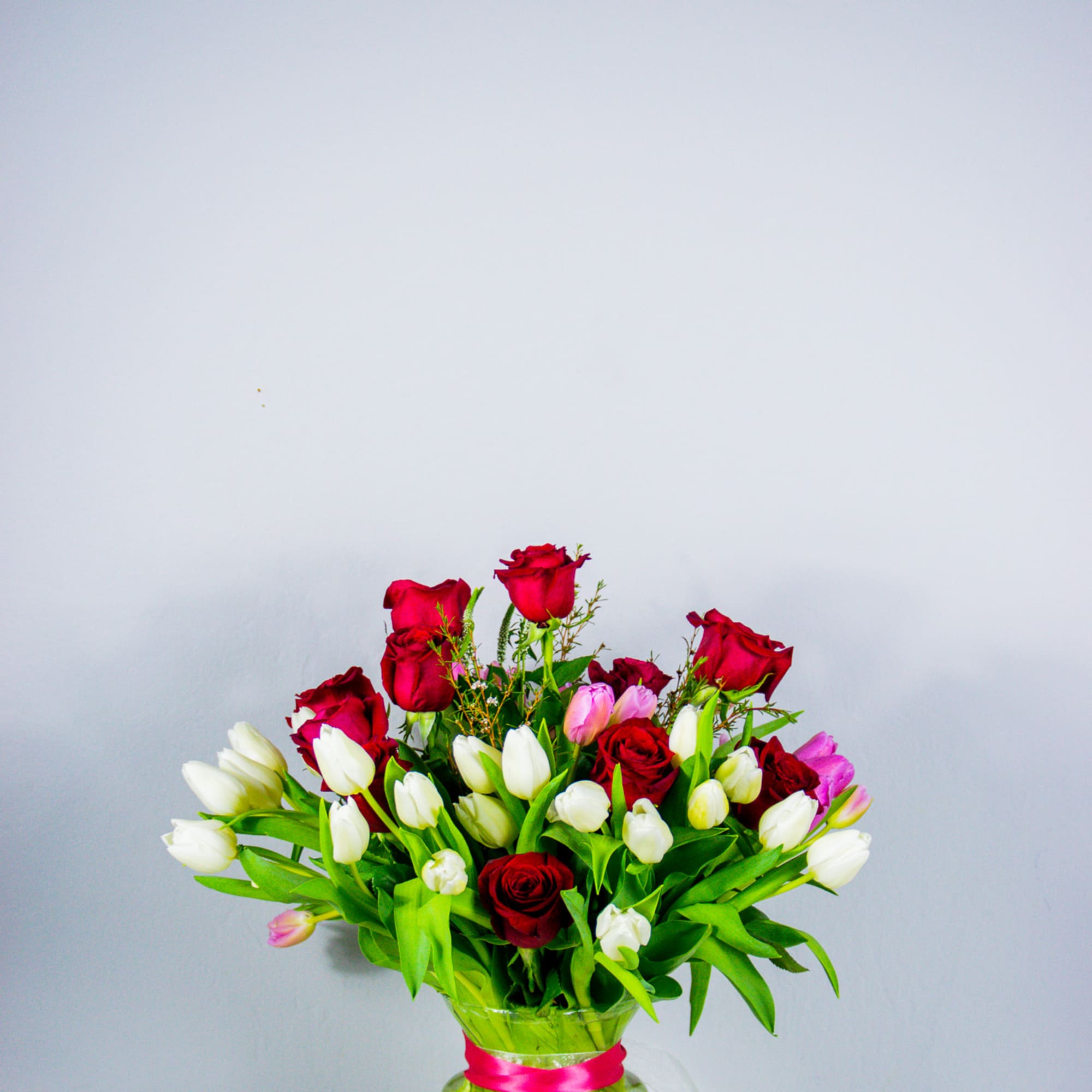 Mix of 40 tulips and a dozen red roses
