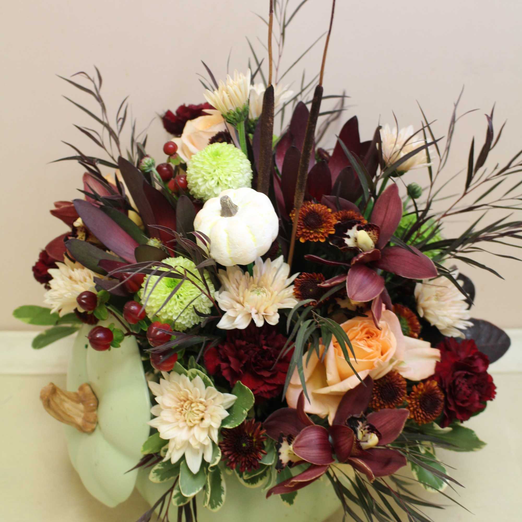 Bring autumn&#039;s charm to your table with Sage Harvest Bouquet, a delightful