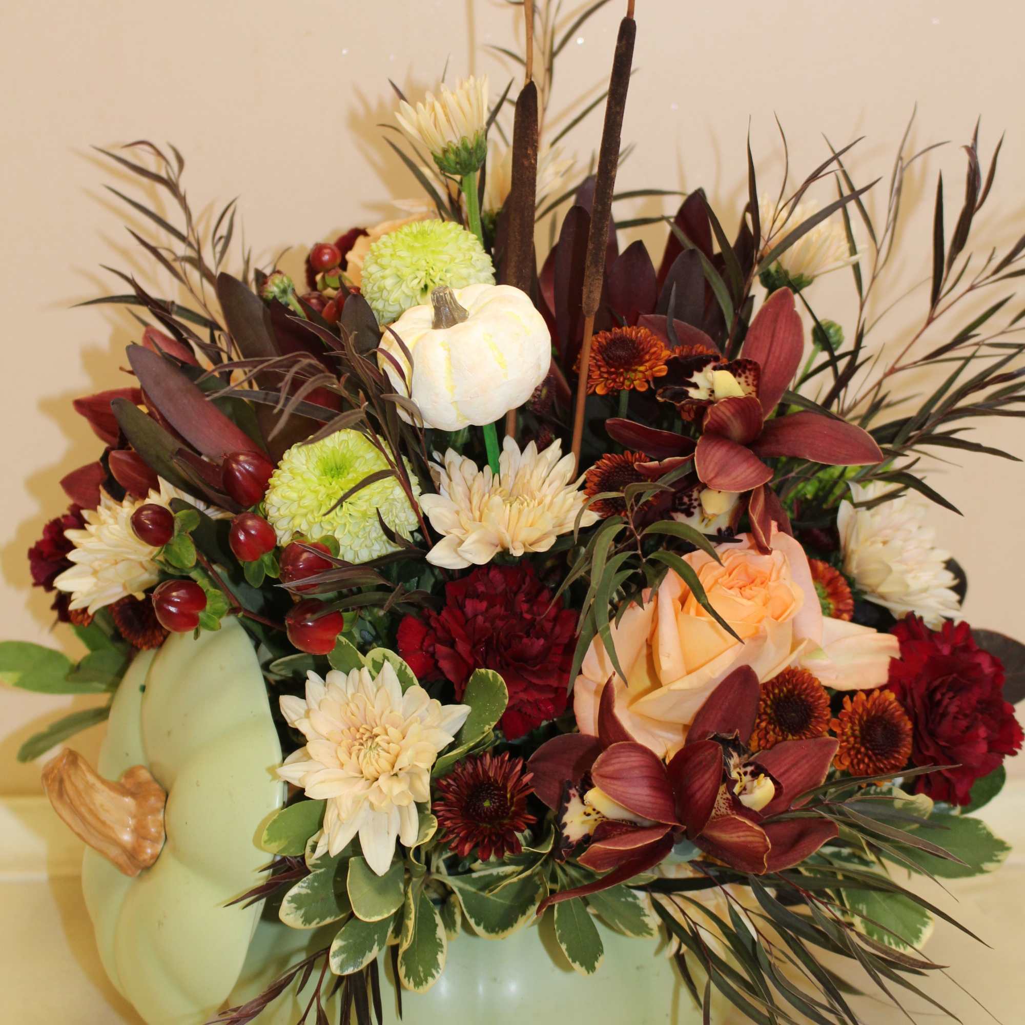 Bring autumn&#039;s charm to your table with Sage Harvest Bouquet, a delightful
