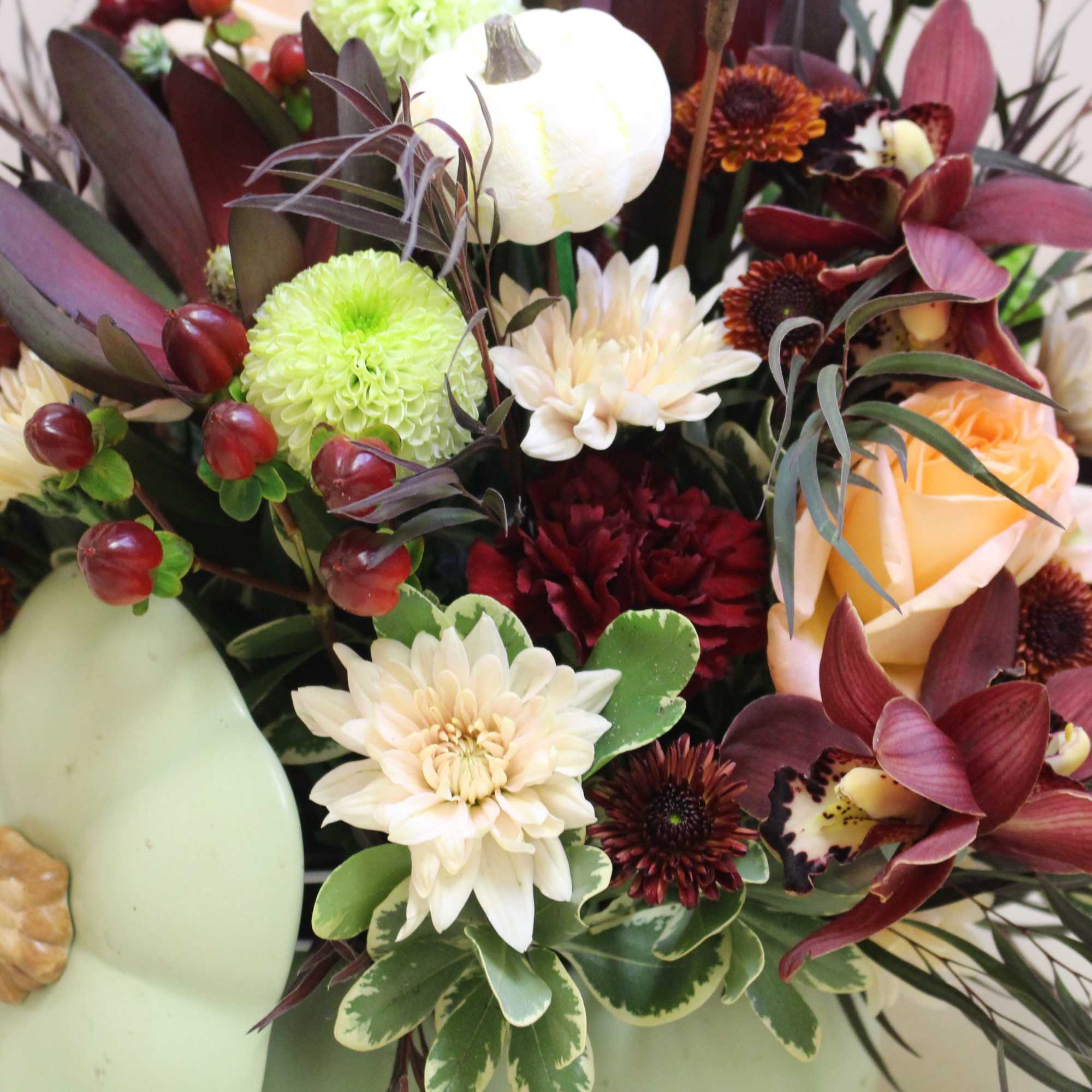 Bring autumn&#039;s charm to your table with Sage Harvest Bouquet, a delightful