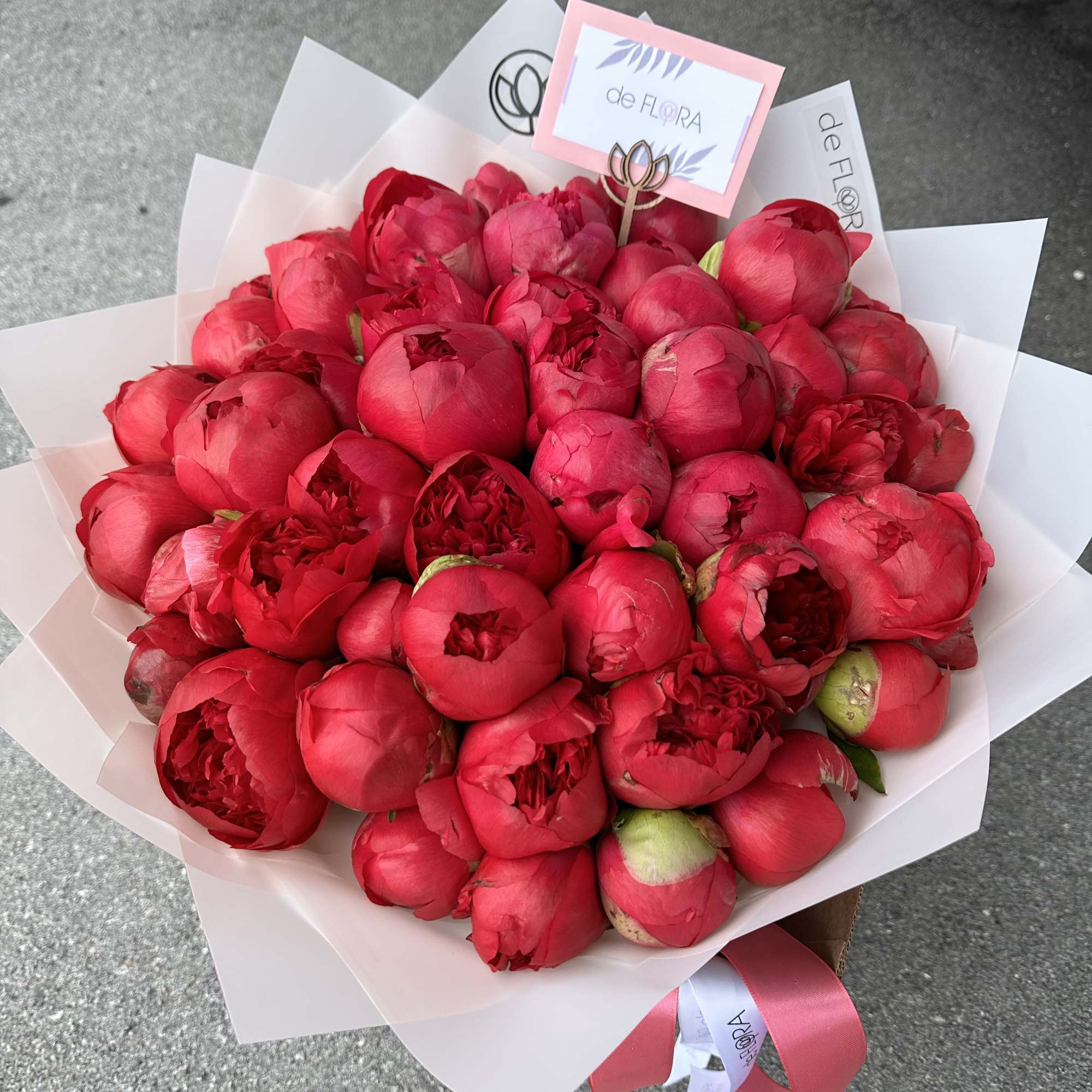 Bouquet of peonies with floral wrap. 
Standard - 20 stems 
Deluxe - Bouquet of peonies with floral wrap. 
Standard - 20 stems 
Deluxe -