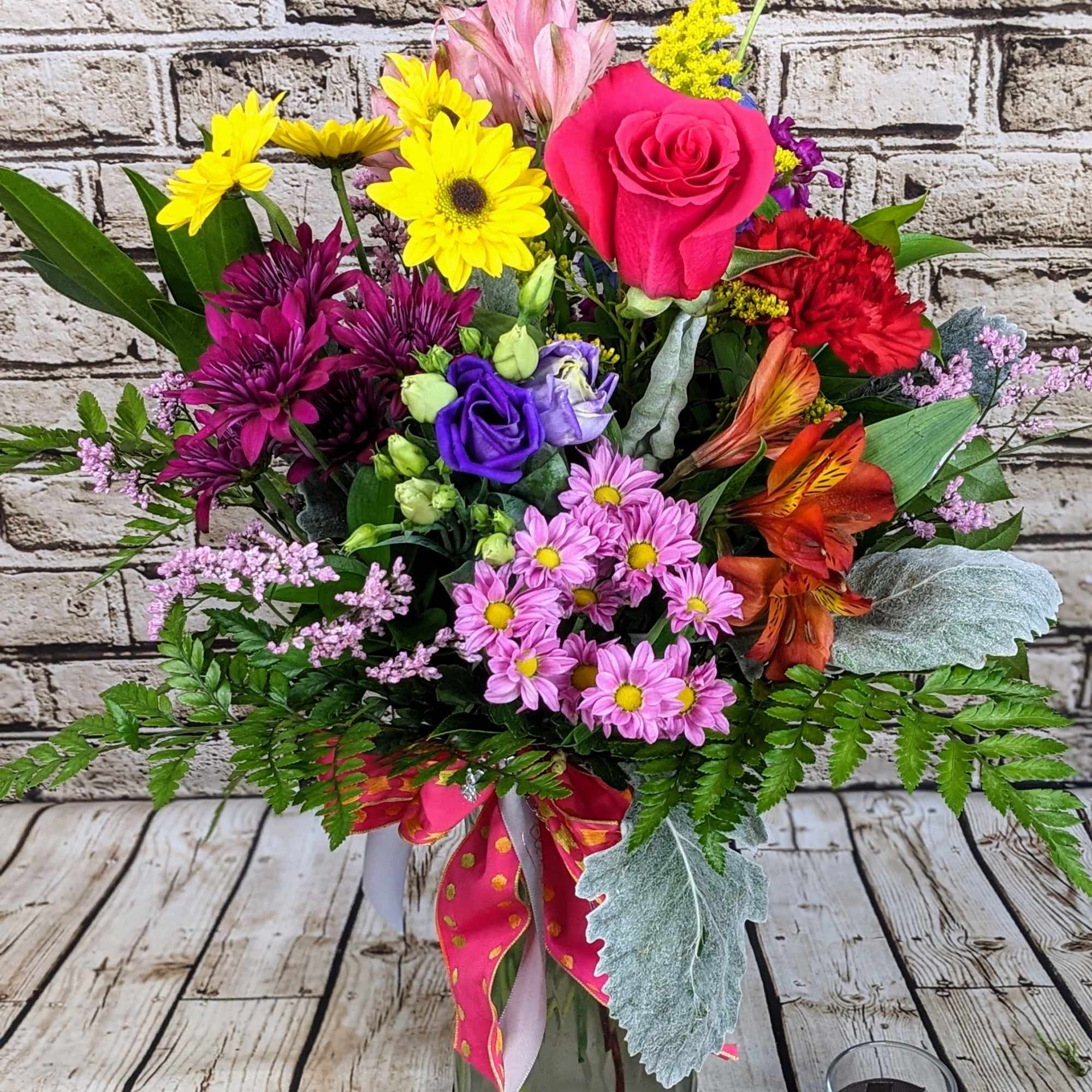 Our Rainbow Beauty arrangement incorporates everything we love about color all in Our Rainbow Beauty arrangement incorporates everything we love about color all in