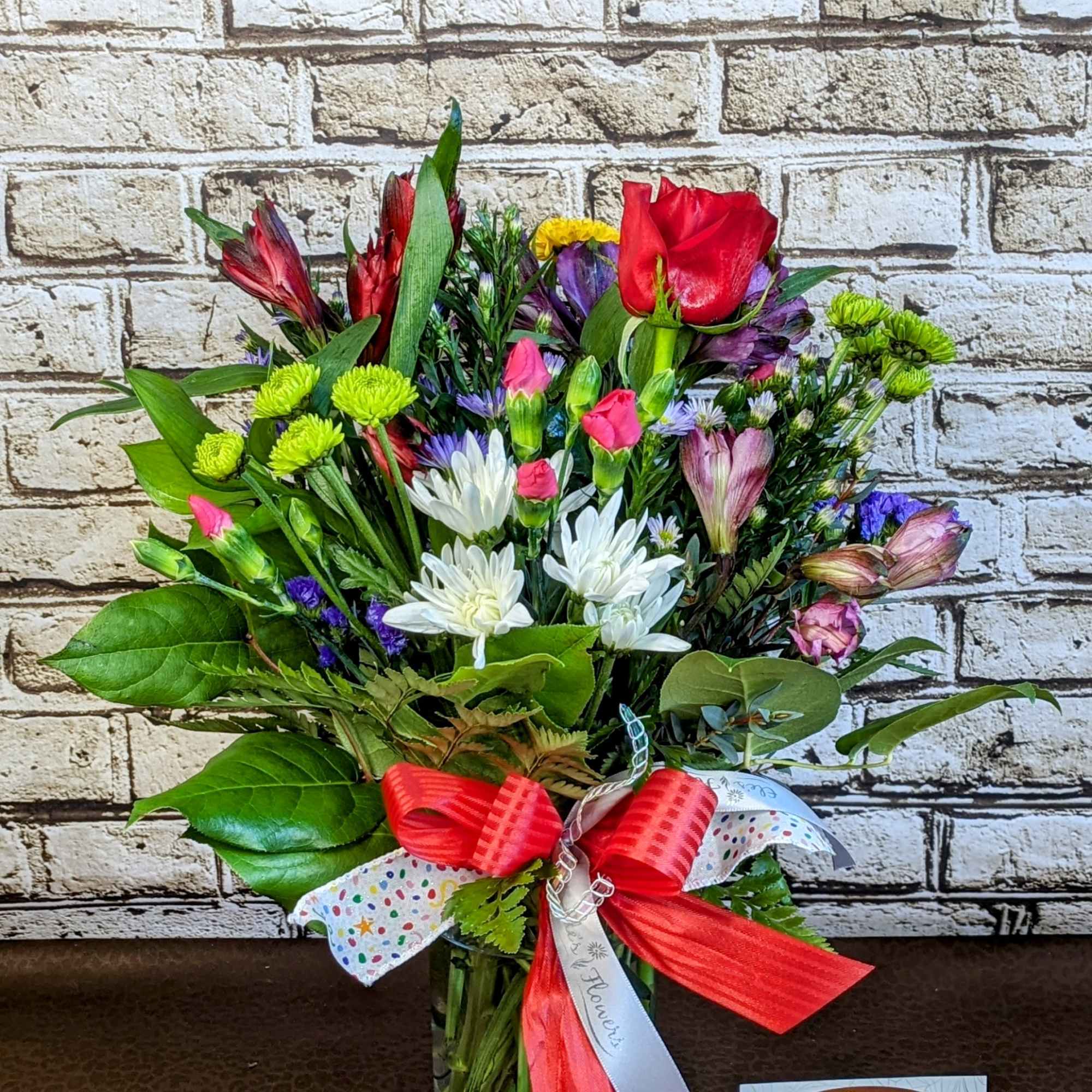 Our Rainbow Beauty arrangement incorporates everything we love about color all in Our Rainbow Beauty arrangement incorporates everything we love about color all in