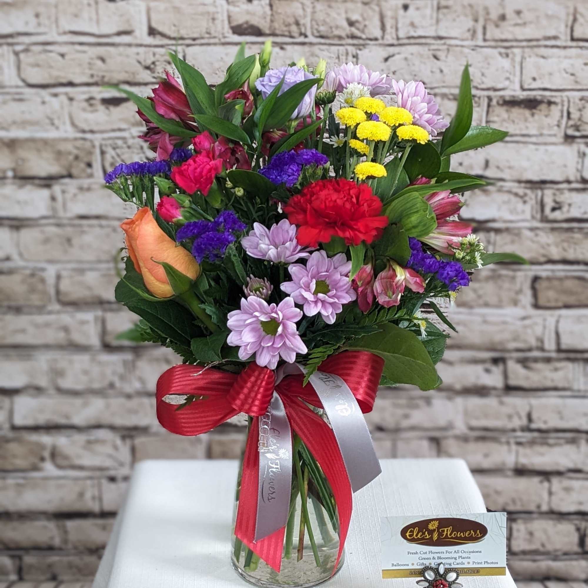 Our Rainbow Beauty arrangement incorporates everything we love about color all in Our Rainbow Beauty arrangement incorporates everything we love about color all in