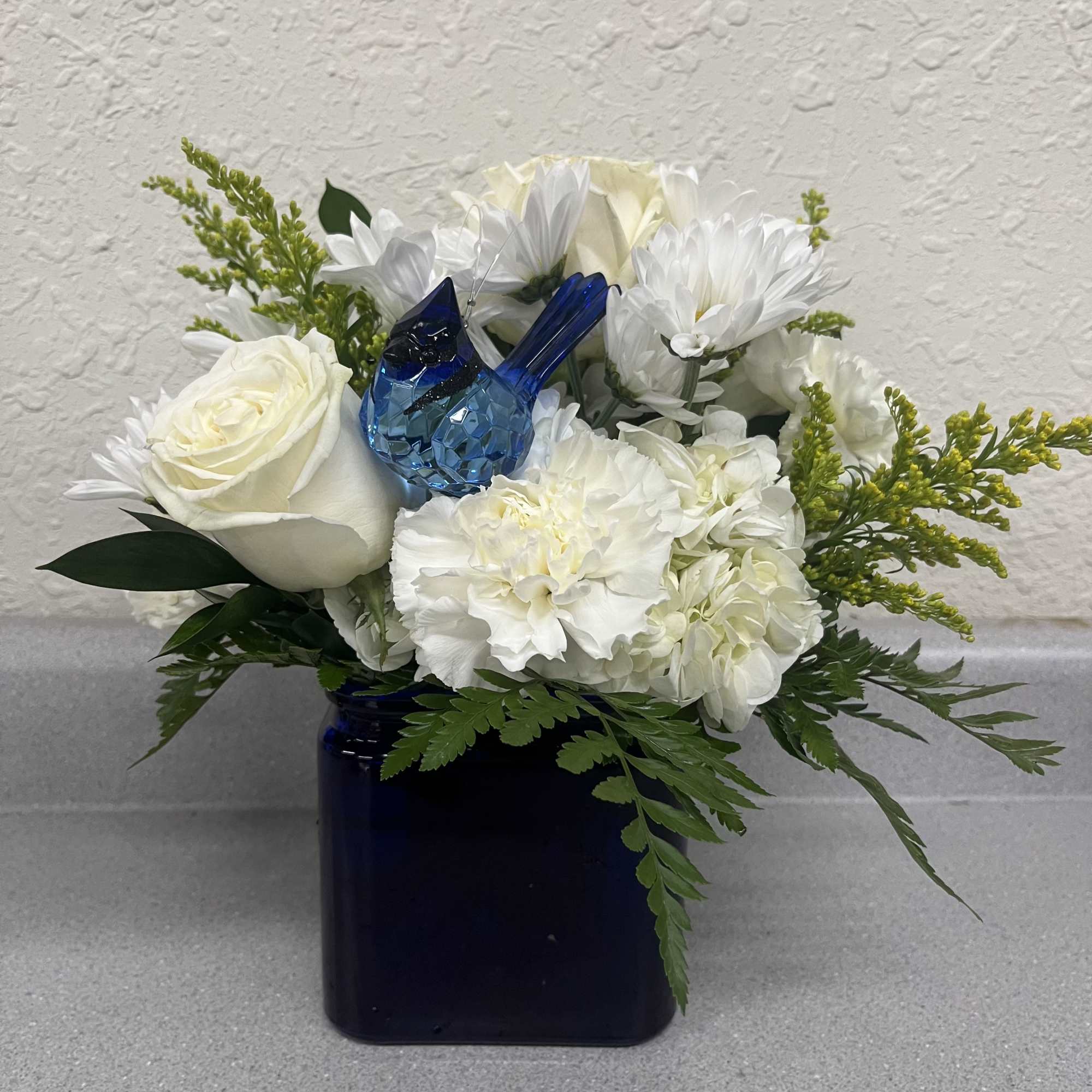 Need a little pick me up?
This simple and elegant arrangement is perfect