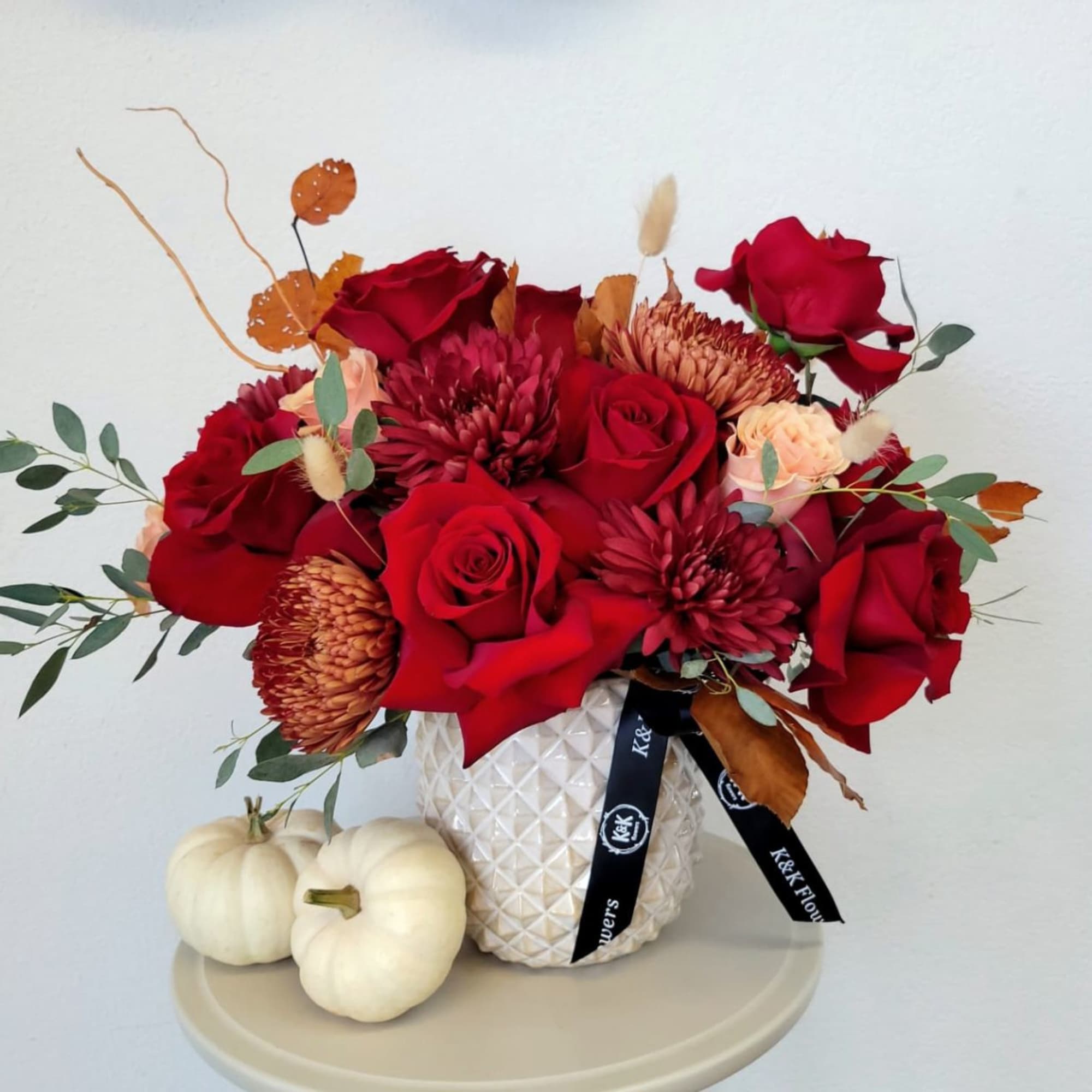Part of our &quot;Fall Elegance&quot; collection. This beautiful arrangement have reflexes red