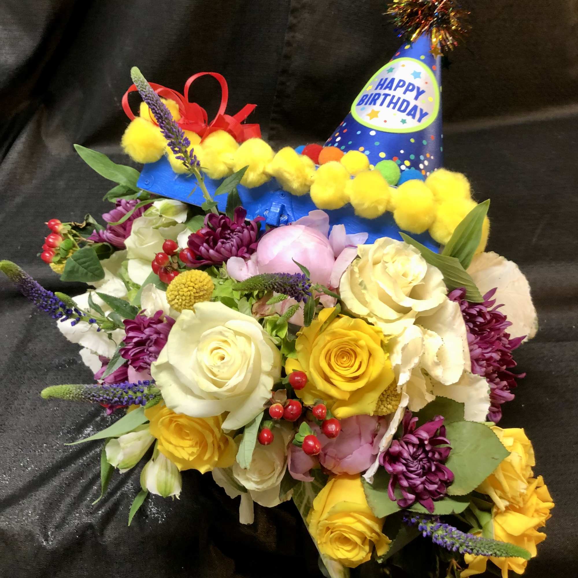 A custom box filled with matching blooms