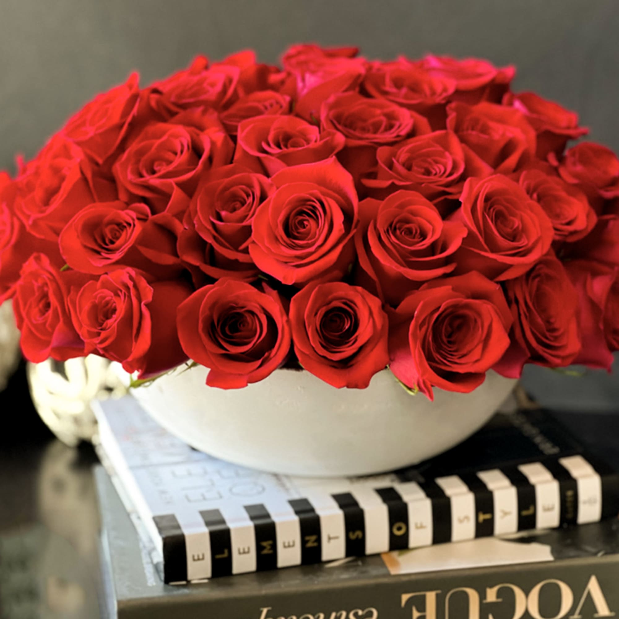 50 red roses in custom made cement vase 