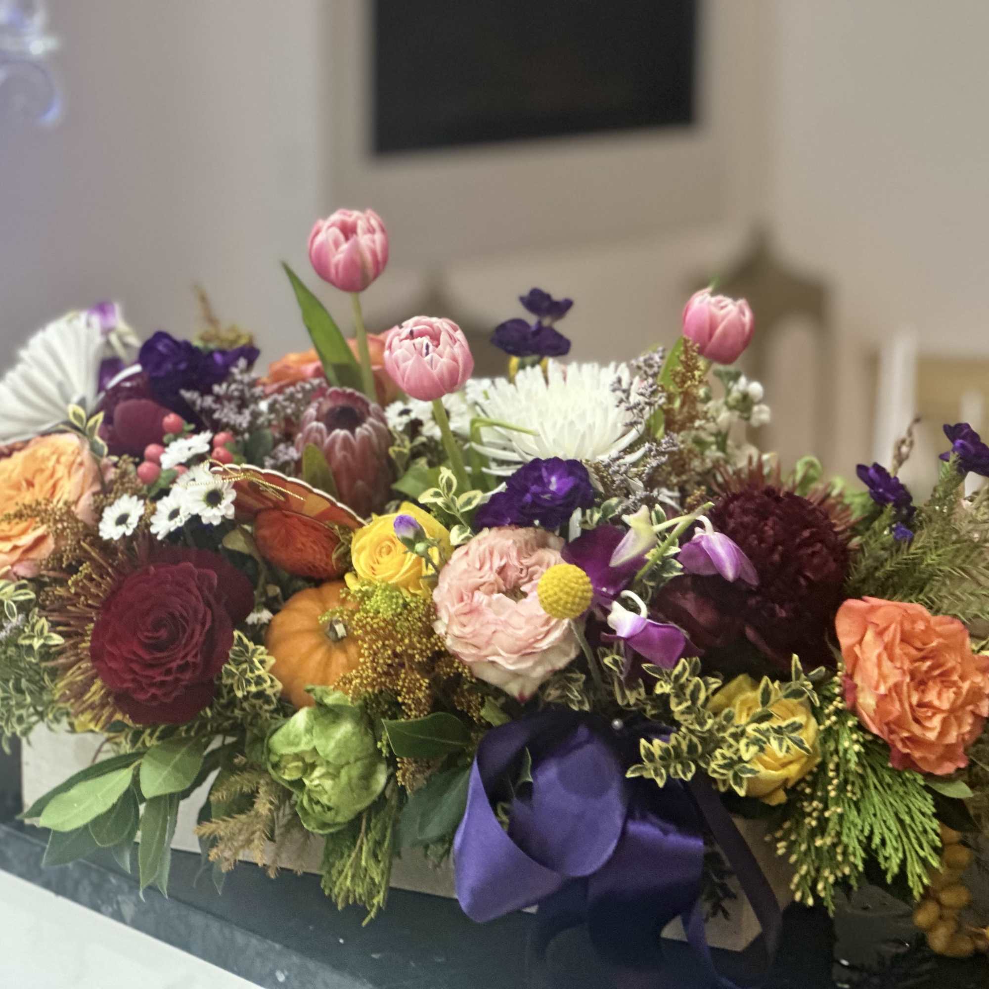 Make any table beautiful with Springtime Featuring a variety of roses and