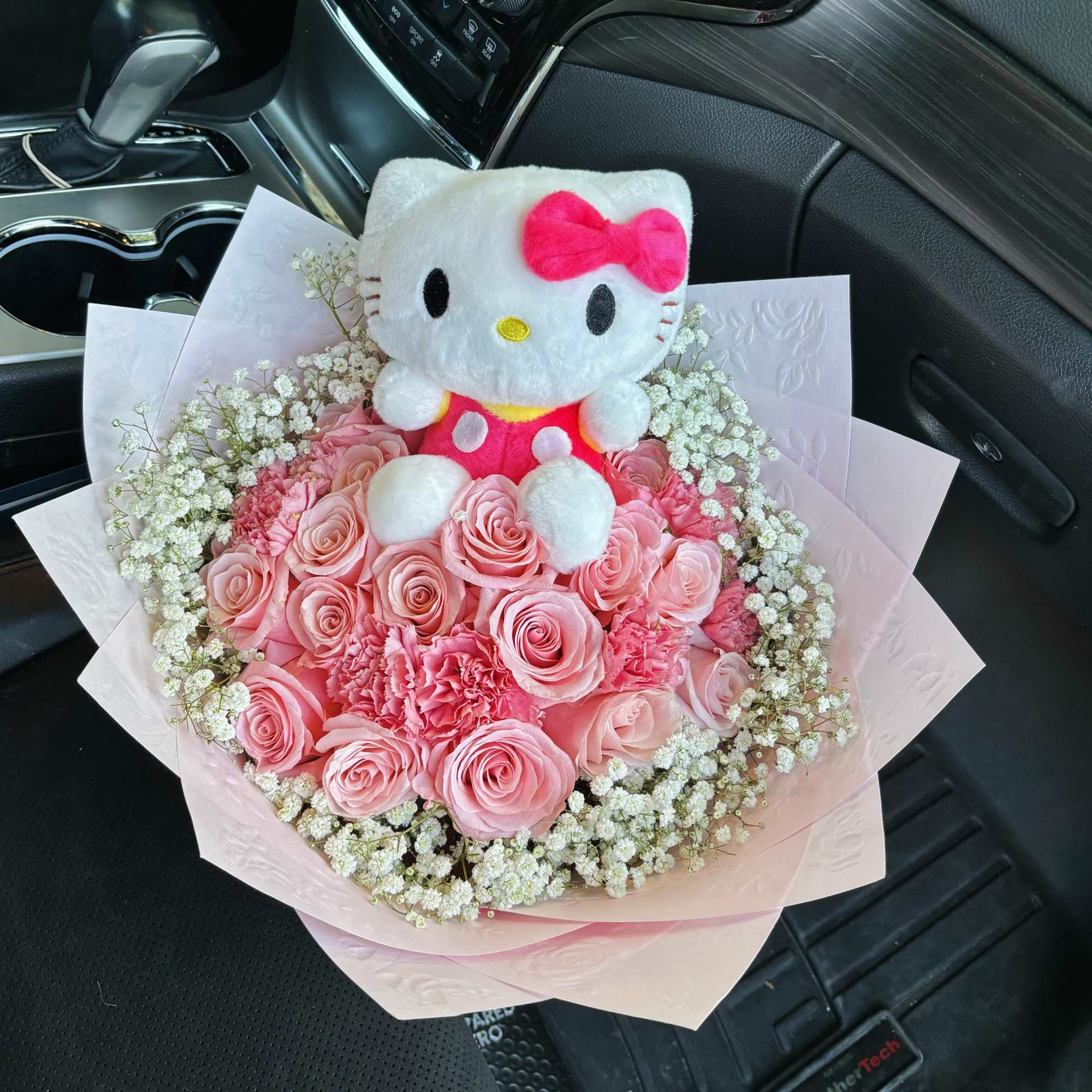 Pink toned bouquet with kitty plushie, pink roses, pink carnations &amp; baby