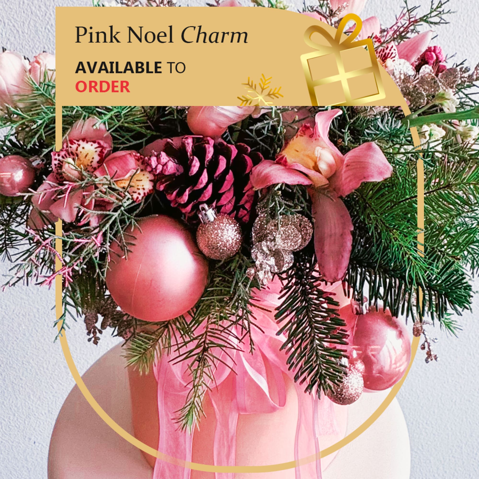 This Christmas arrangement is a festive and elegant centerpiece designed to bring This Christmas arrangement is a festive and elegant centerpiece designed to bring