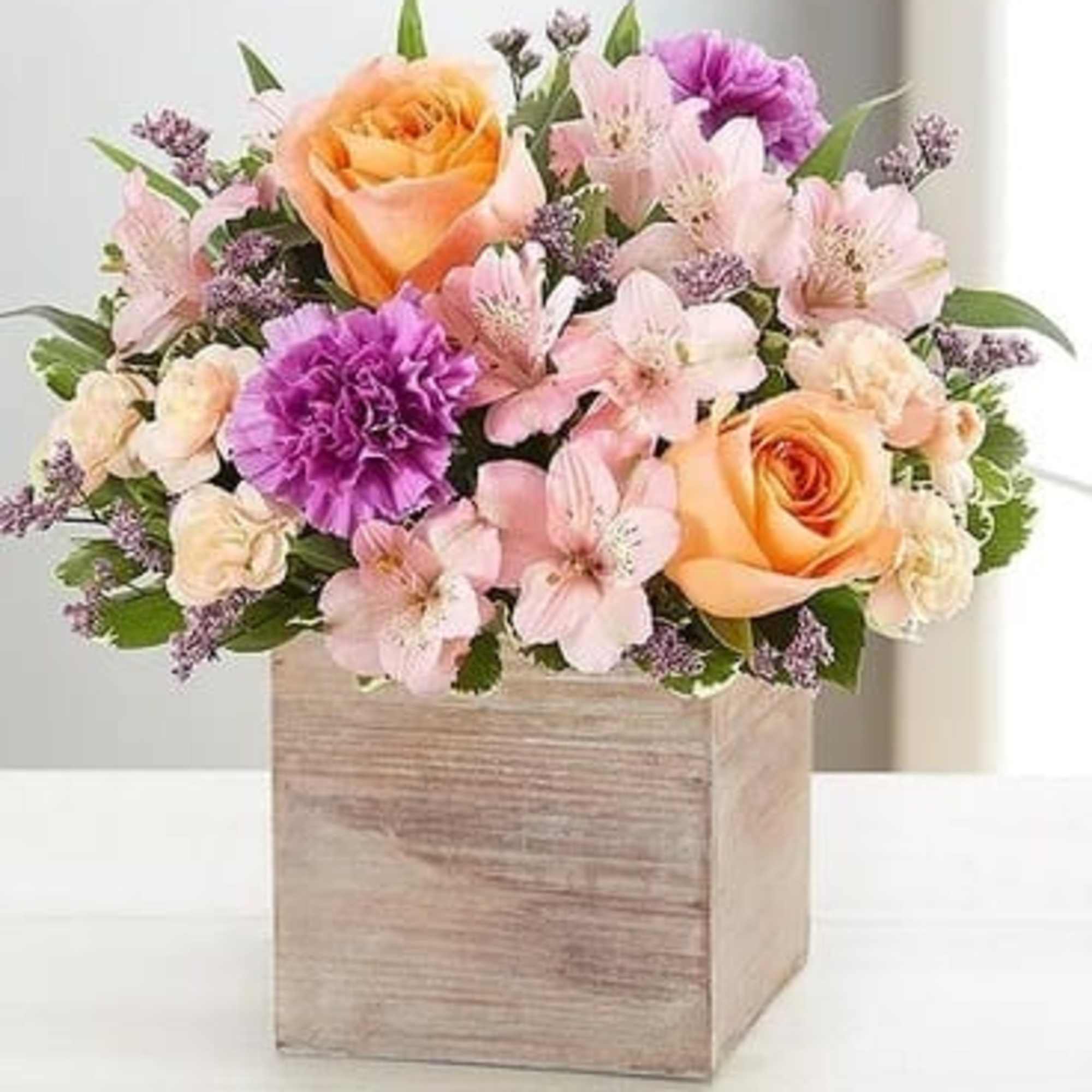 Chic meets sweet. Our new bouquet flaunts fresh spring style, gathered with