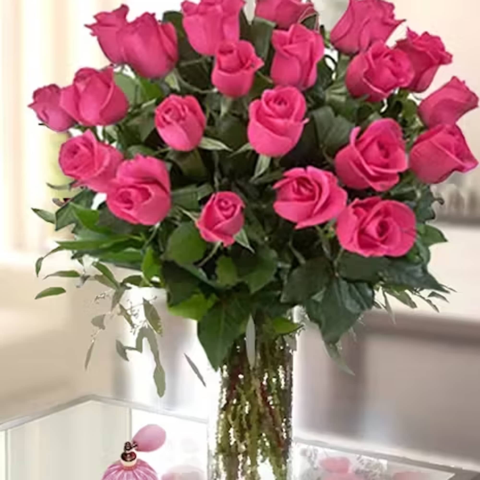 Perfect Hot Pink Roses featuring longer stems and vase life. Choose a