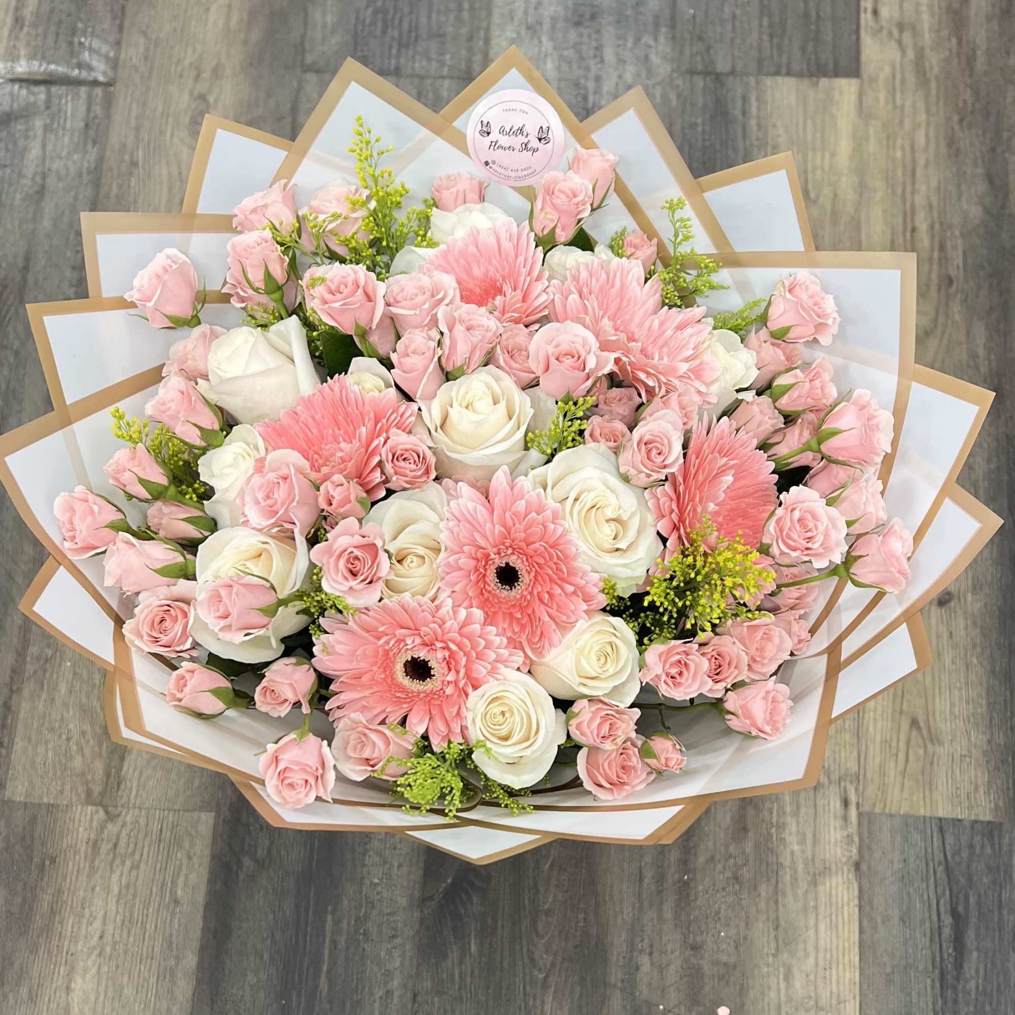 Buyer will receive a mix bouquet: White roses, Pink mini roses and