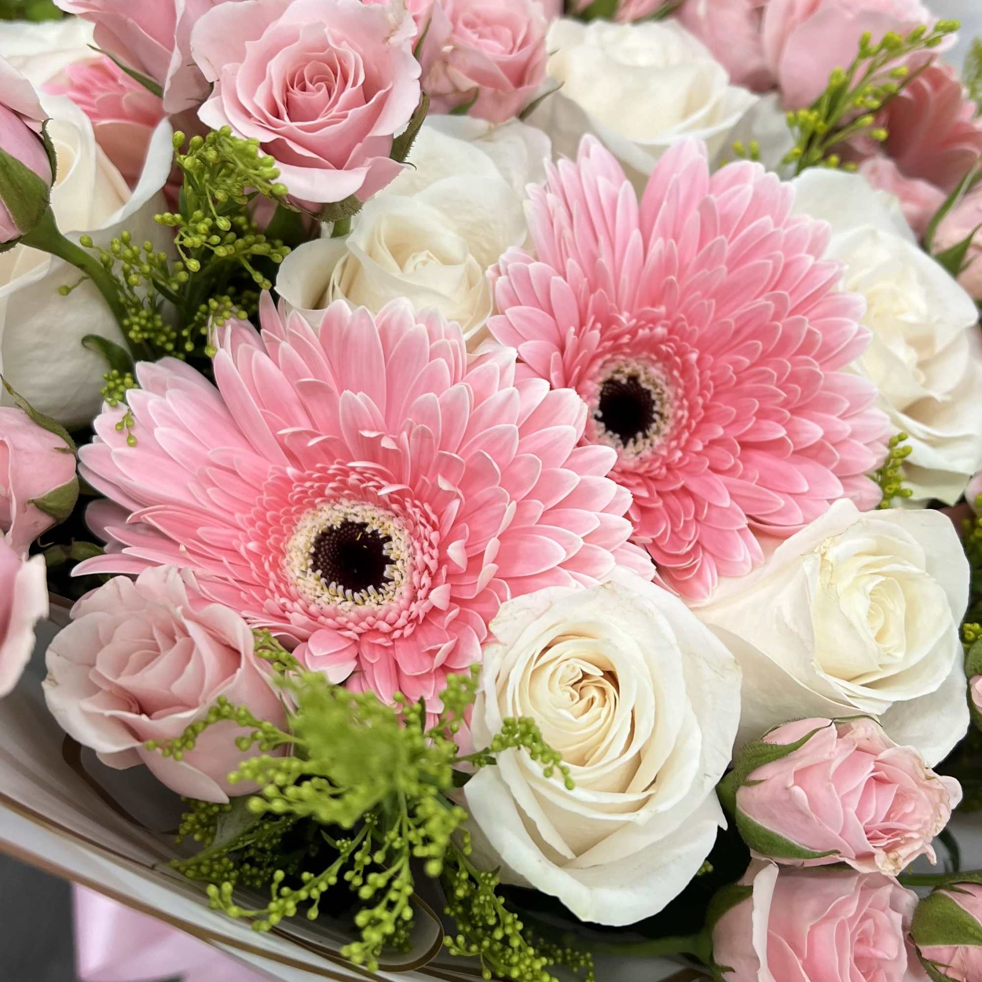 Buyer will receive a mix bouquet: White roses, Pink mini roses and