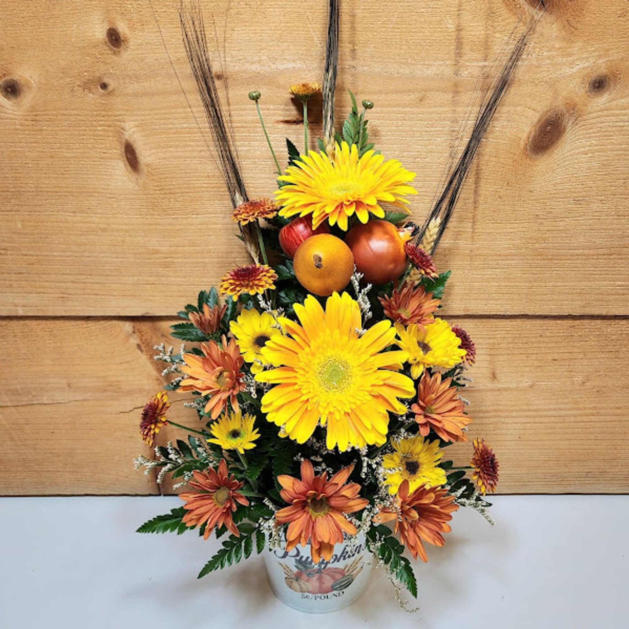 The Welcome Autumn Fresh flower arrangement by Savilles Country Florist is a The Welcome Autumn Fresh flower arrangement by Savilles Country Florist is a