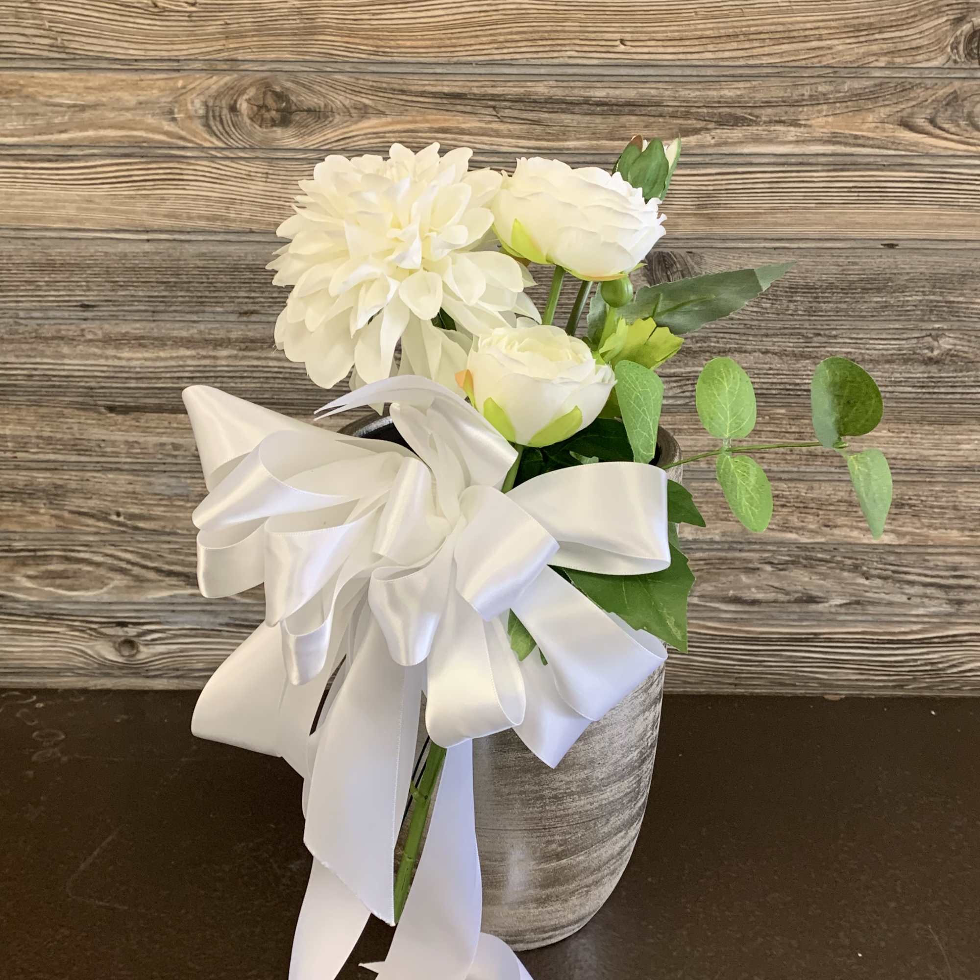Beautiful lush assortment of White dahlias, hydrangeas, ranunuculus, lambs ear, and other