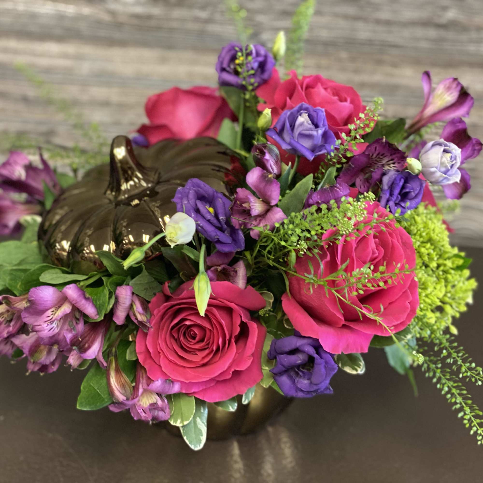 Something different! A mixture of jeweled tones green hydrangeas, purple lisianthus, purple
