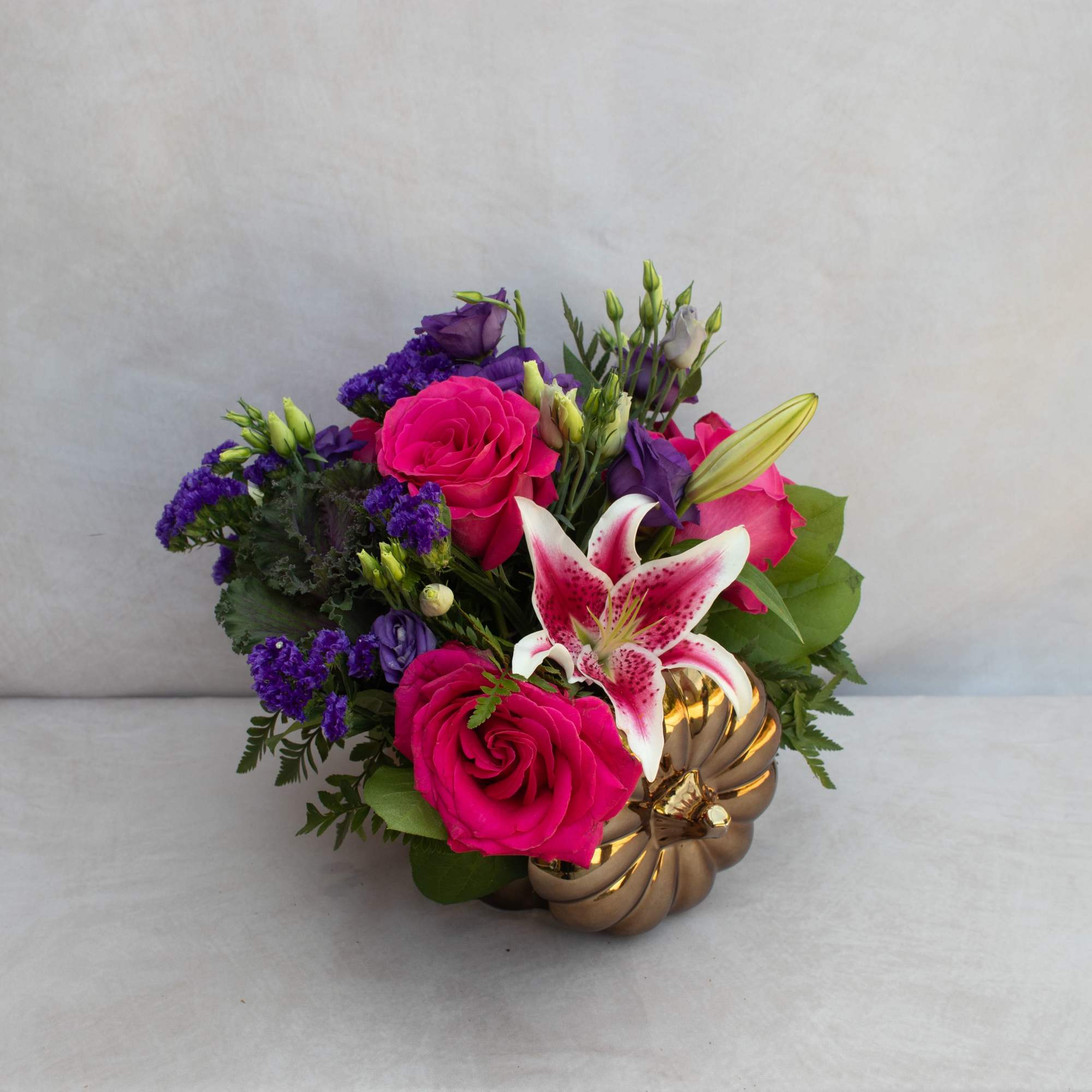 Something different! A mixture of jeweled tones green hydrangeas, purple lisianthus, purple