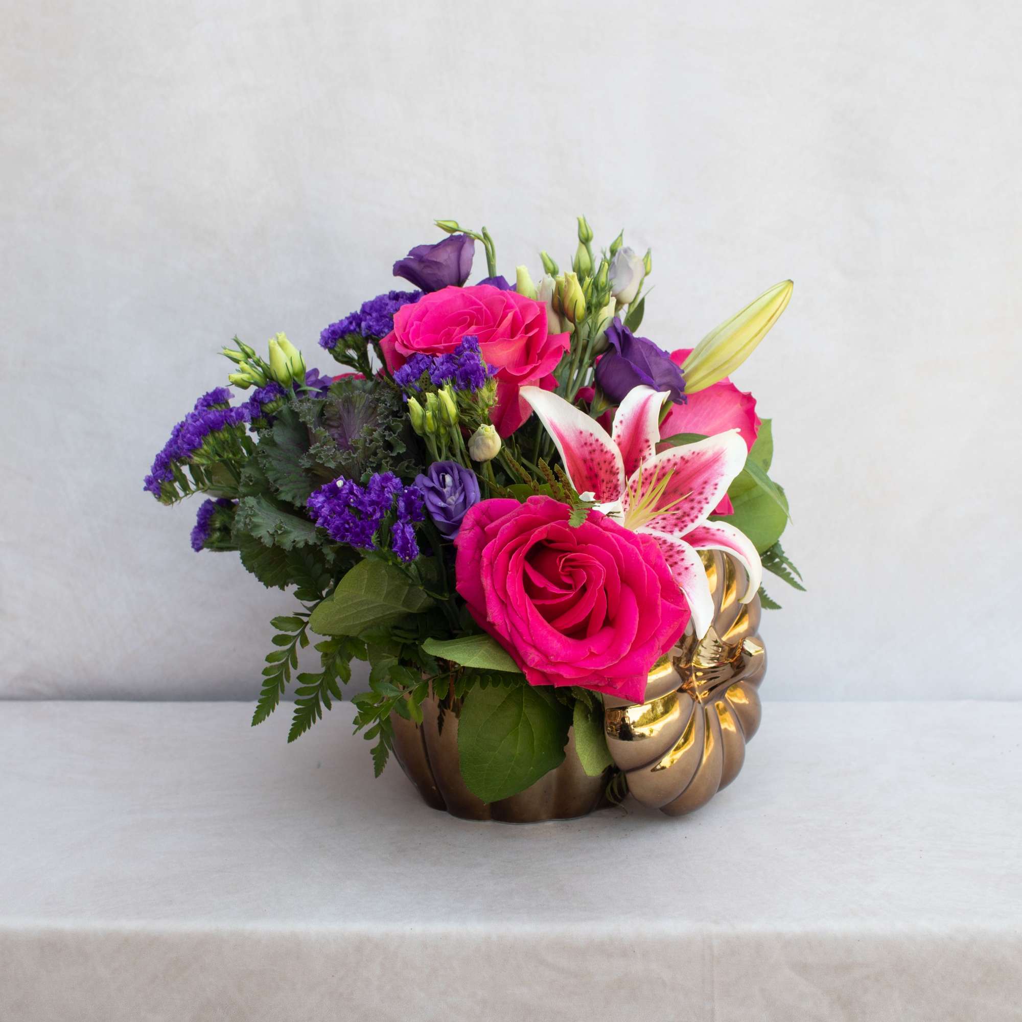 Something different! A mixture of jeweled tones green hydrangeas, purple lisianthus, purple