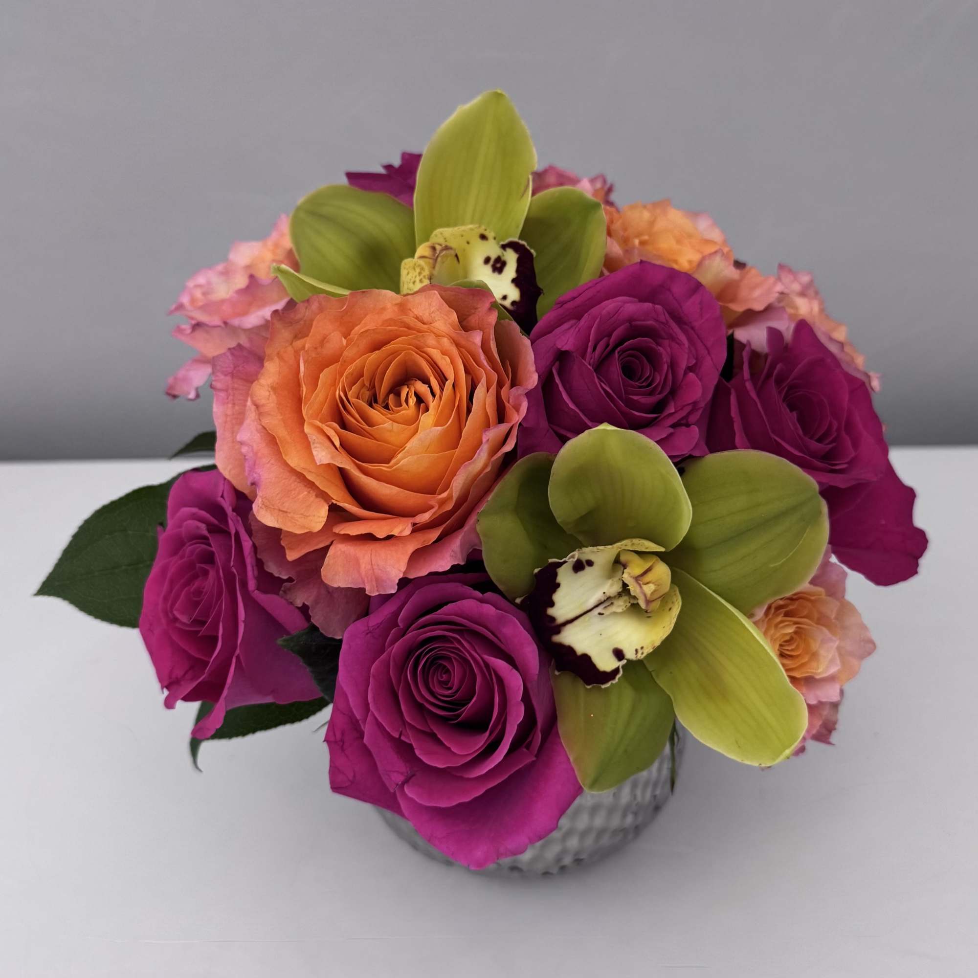 A VIBRANT MIXTURE OF HOT PINK FLOYD & ORANGE FREE SPIRIT ROSES A VIBRANT MIXTURE OF HOT PINK FLOYD & ORANGE FREE SPIRIT ROSES